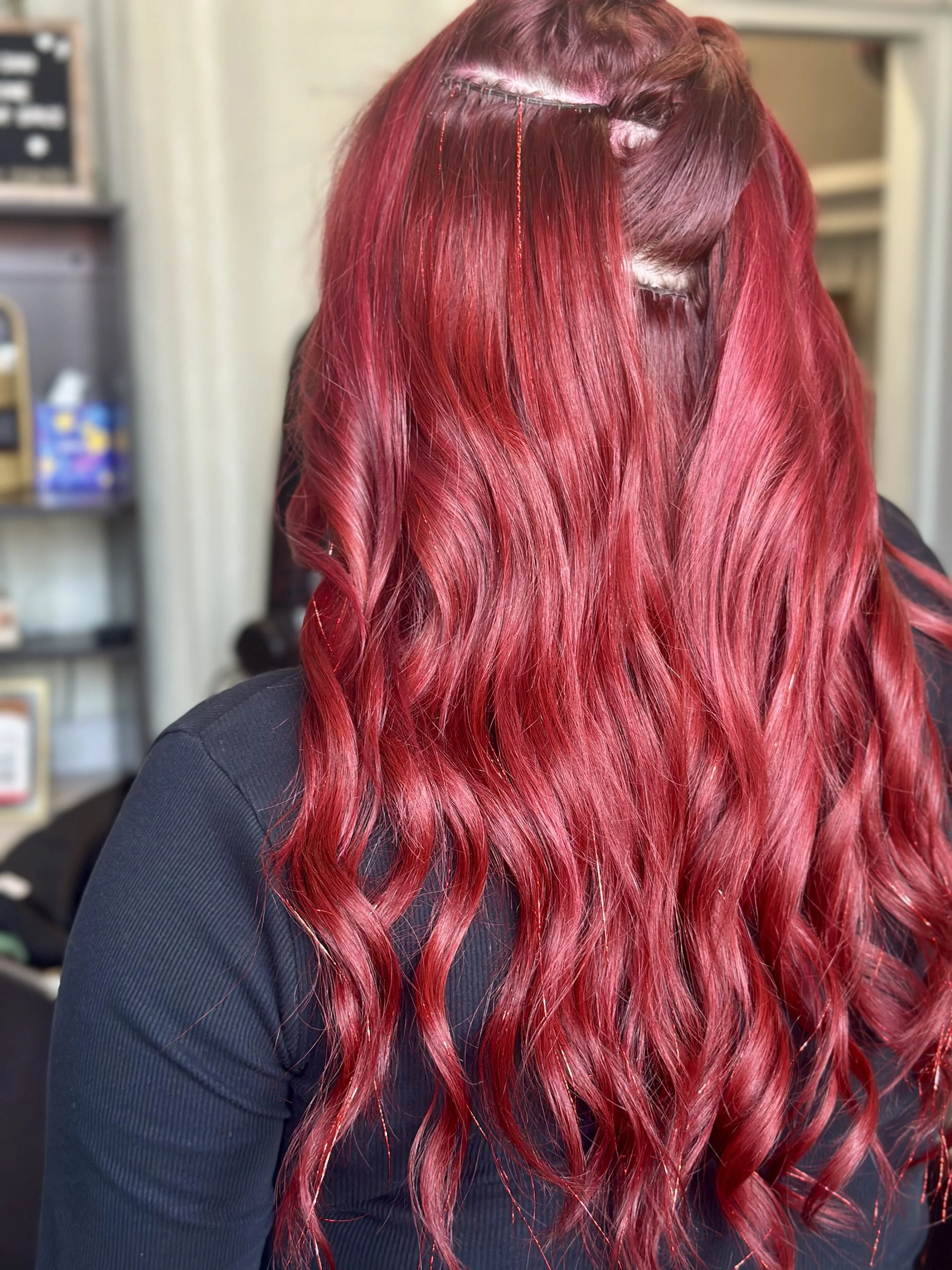 Rich red with two rows of extensions and hair tinsel