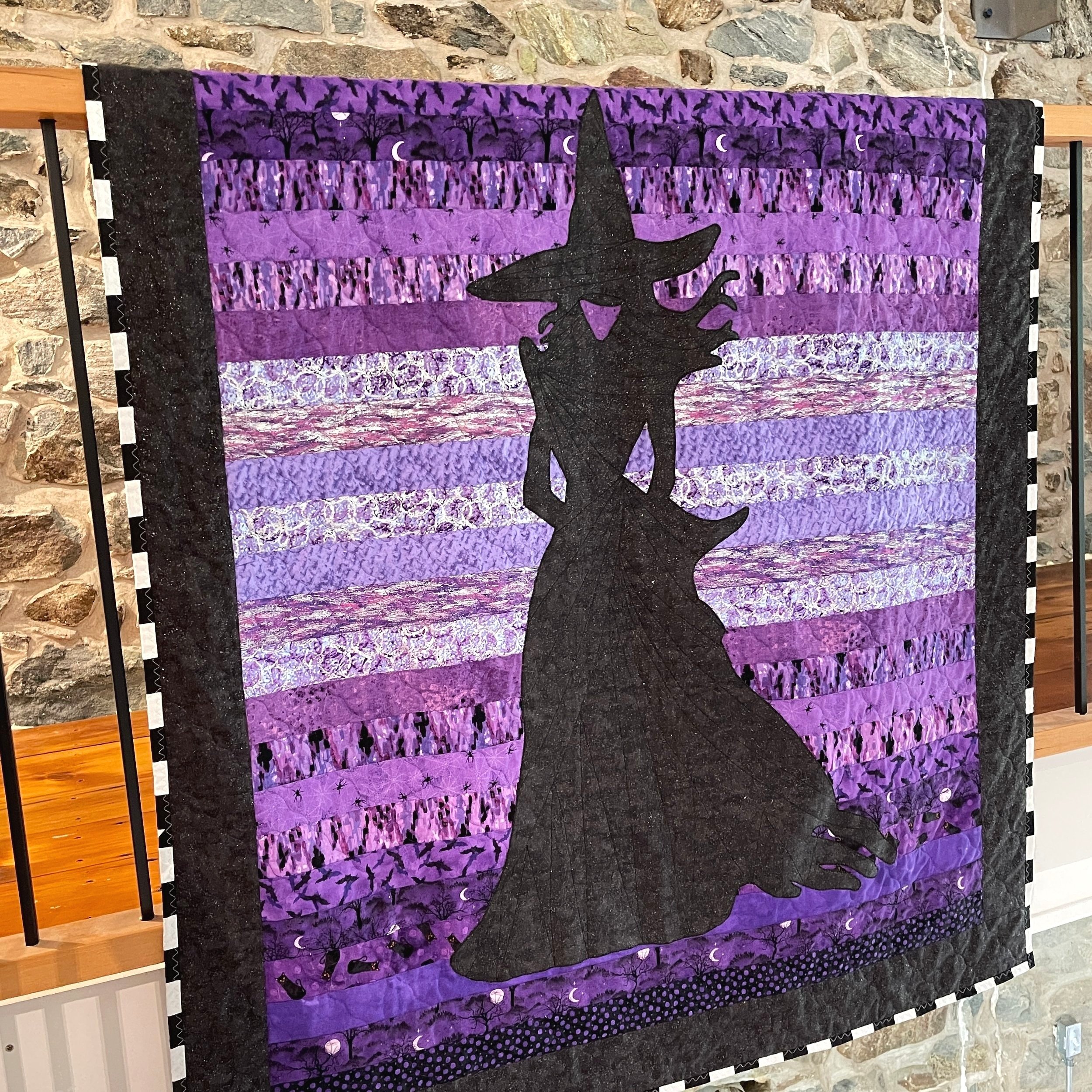 Purple+witch+quilt+hung+on+balcony.jpg