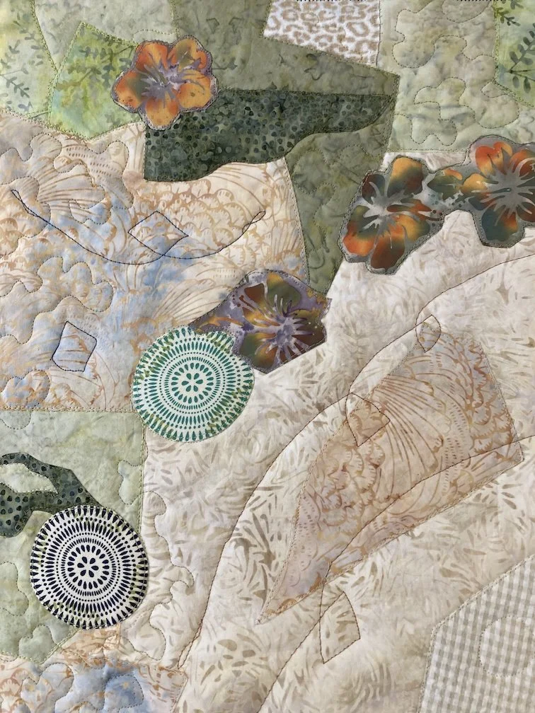 Upper left detail of "Touch" shows circles and flowers and quilt stitching.