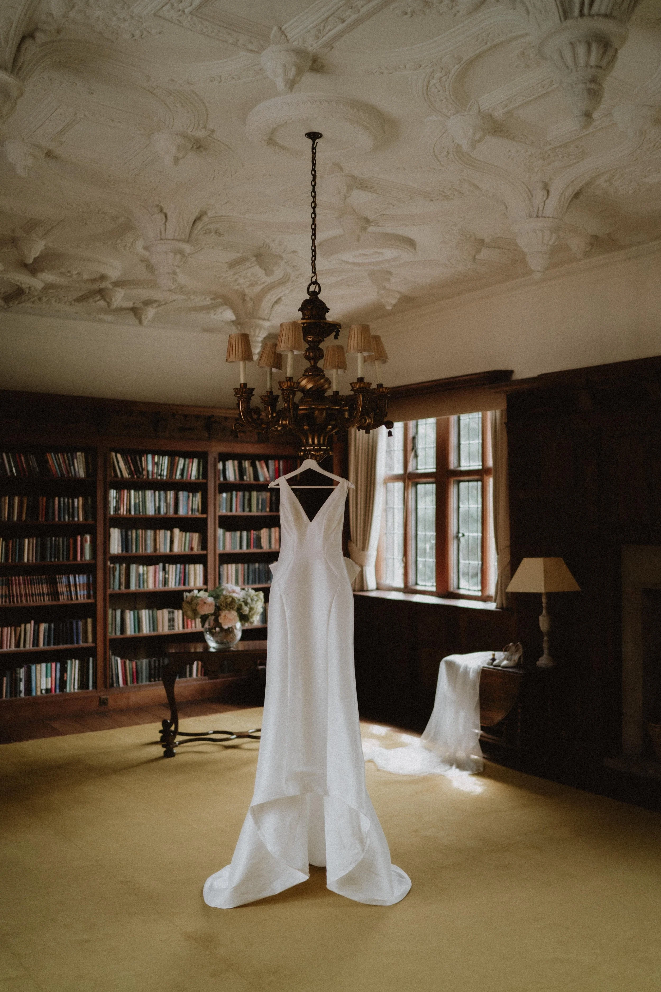 Wedding dress hung up Brinsop Court