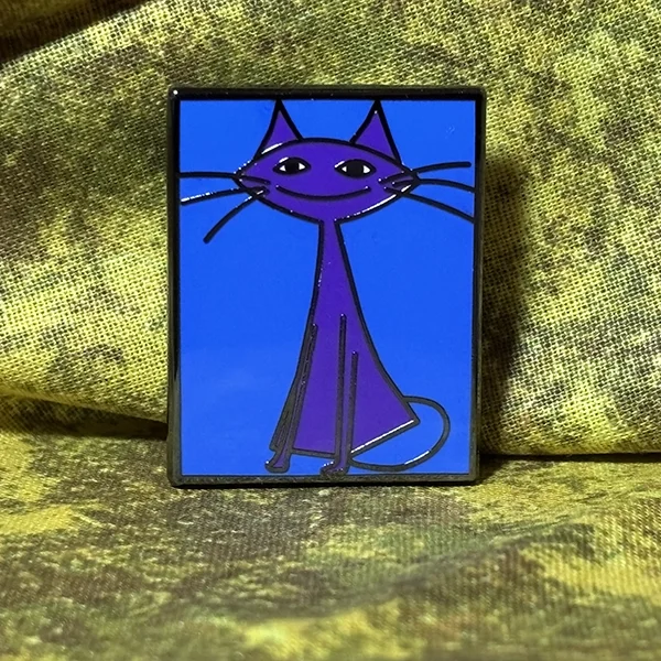 PC Enamel Pin 01 Front on Yellow Green Cloth.webp