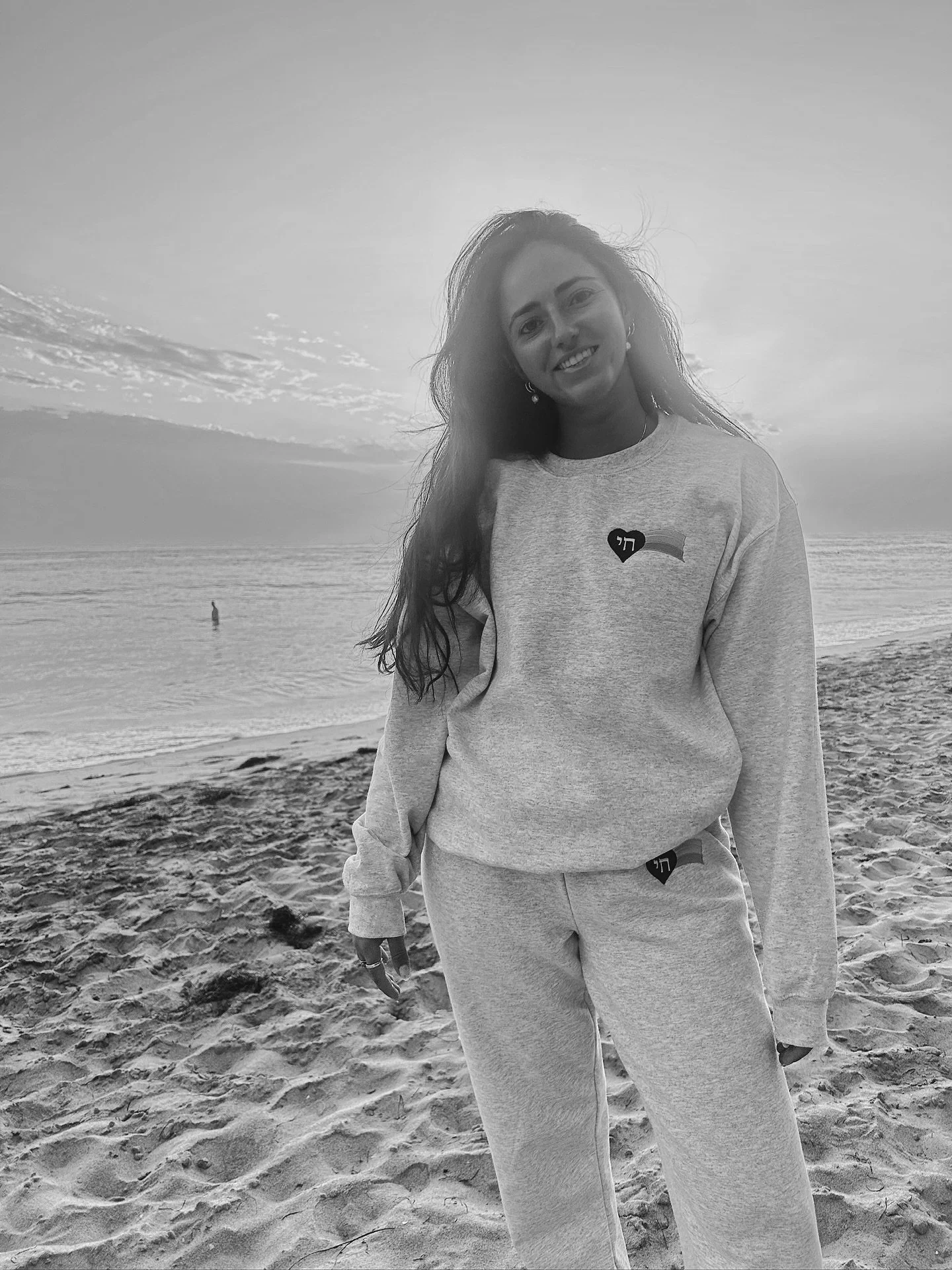 swipe to see the sunset 🌅 @rachel.church in our @coastaltribe.sd collab crewneck