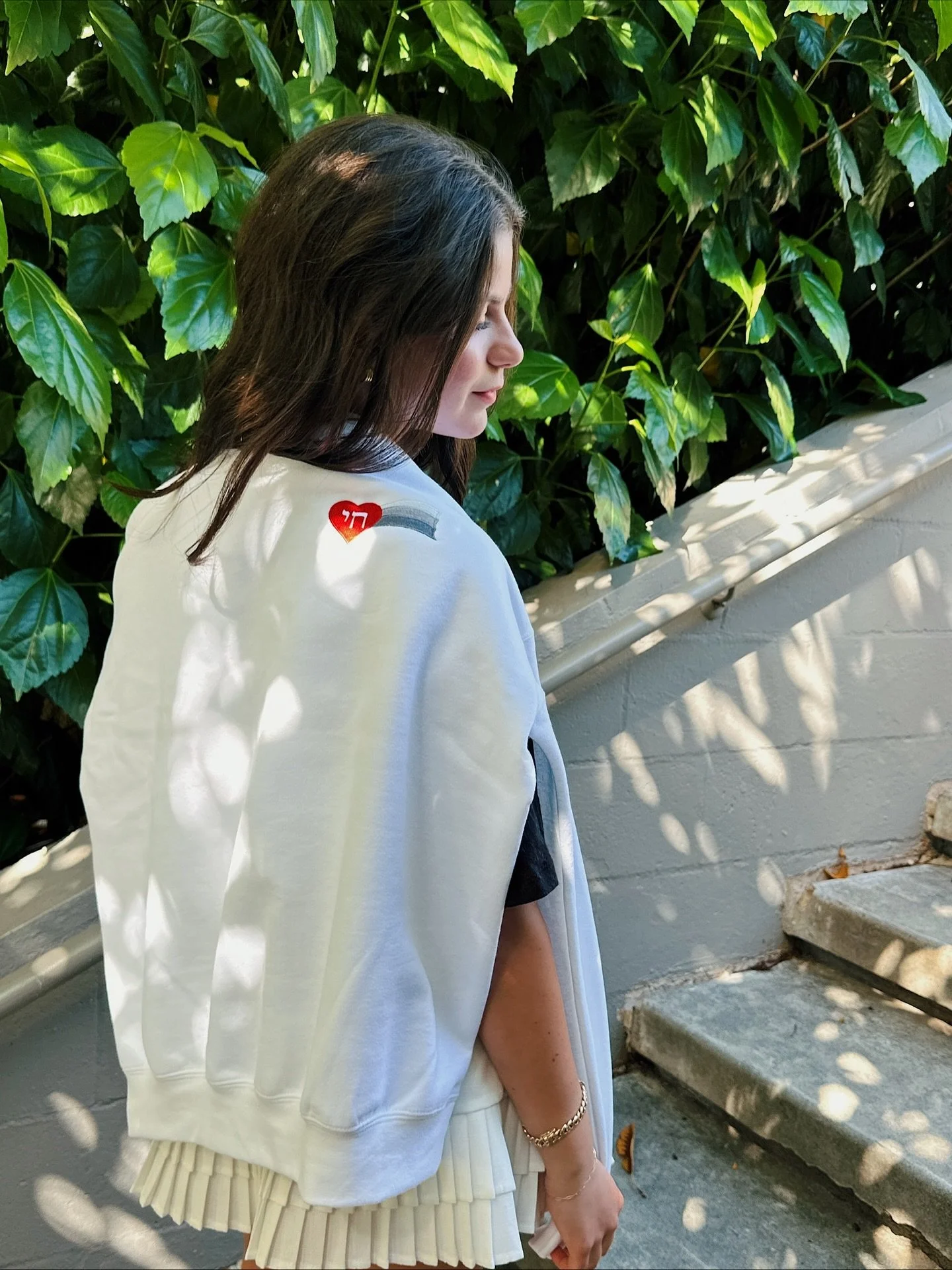 class is in session, and we're repping Chai Vekayam around campus 📝 feat. our blue trucker hat + @ChabadatChapman collab crewneck