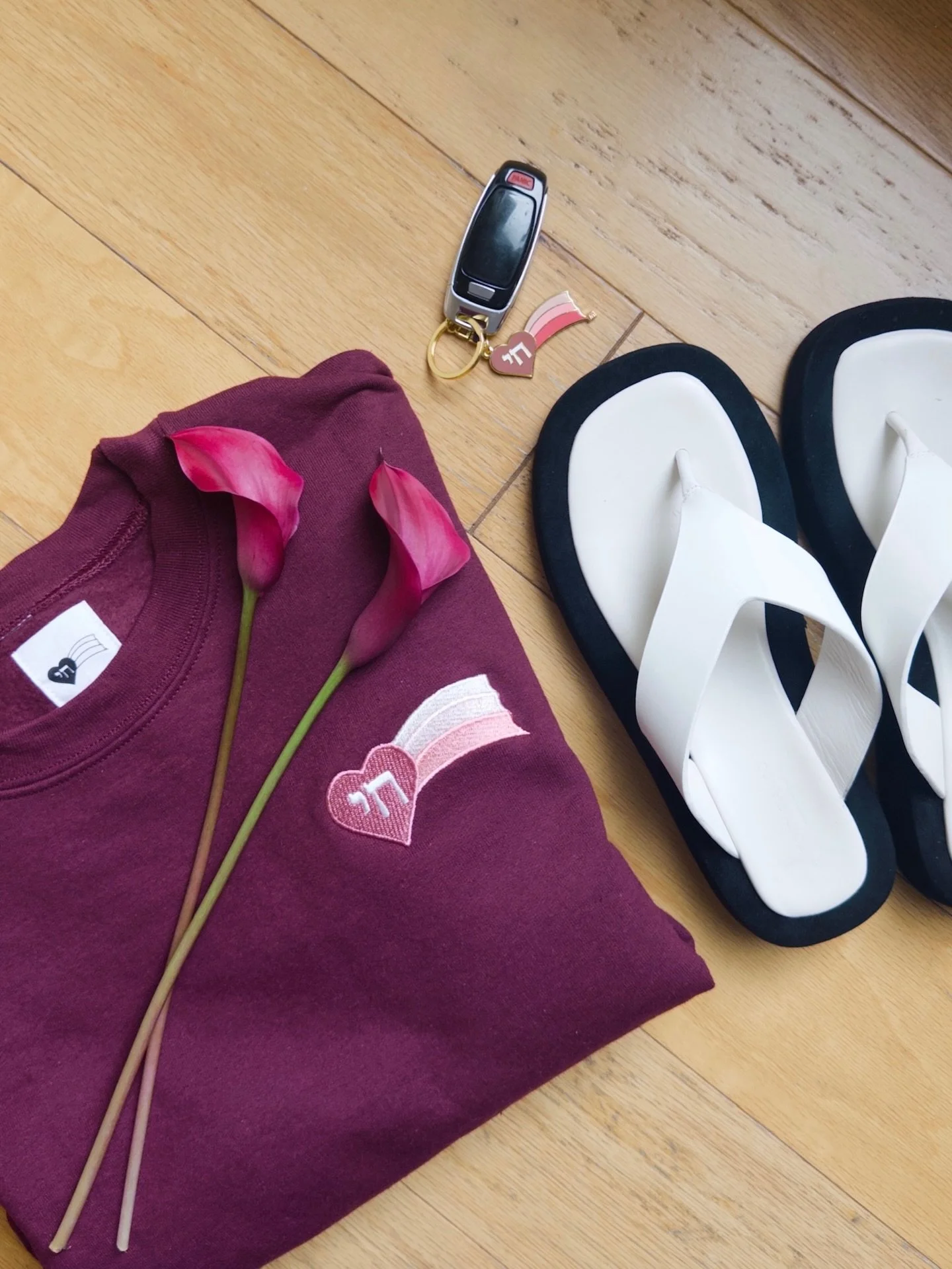 Falling for AHAVA in maroon. Soft layers, easy sandals, and our chai keychain in PINK! Available now, wear it close 💘