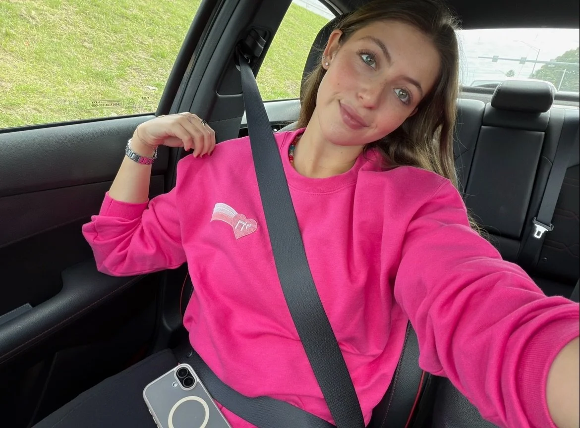 What begins as fabric becomes something personal.

Our rasbperry crewneck was designed to hold more than color: it carries confidence, warmth, and a sense of belonging. It's the kind of piece that shows up in photos, in conversation, in community.

T