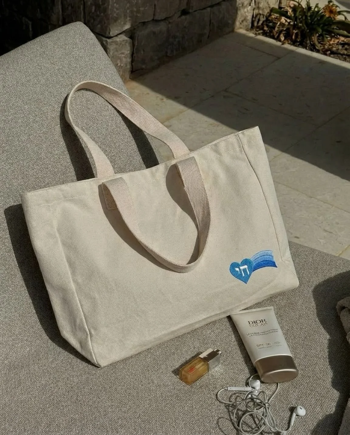 Introducing the Chai Vekayam Beach Tote&mdash;crafted from thick canvas with elevated embroidery and designed to carry it all. Built for beach days, but made to live with you all summer.