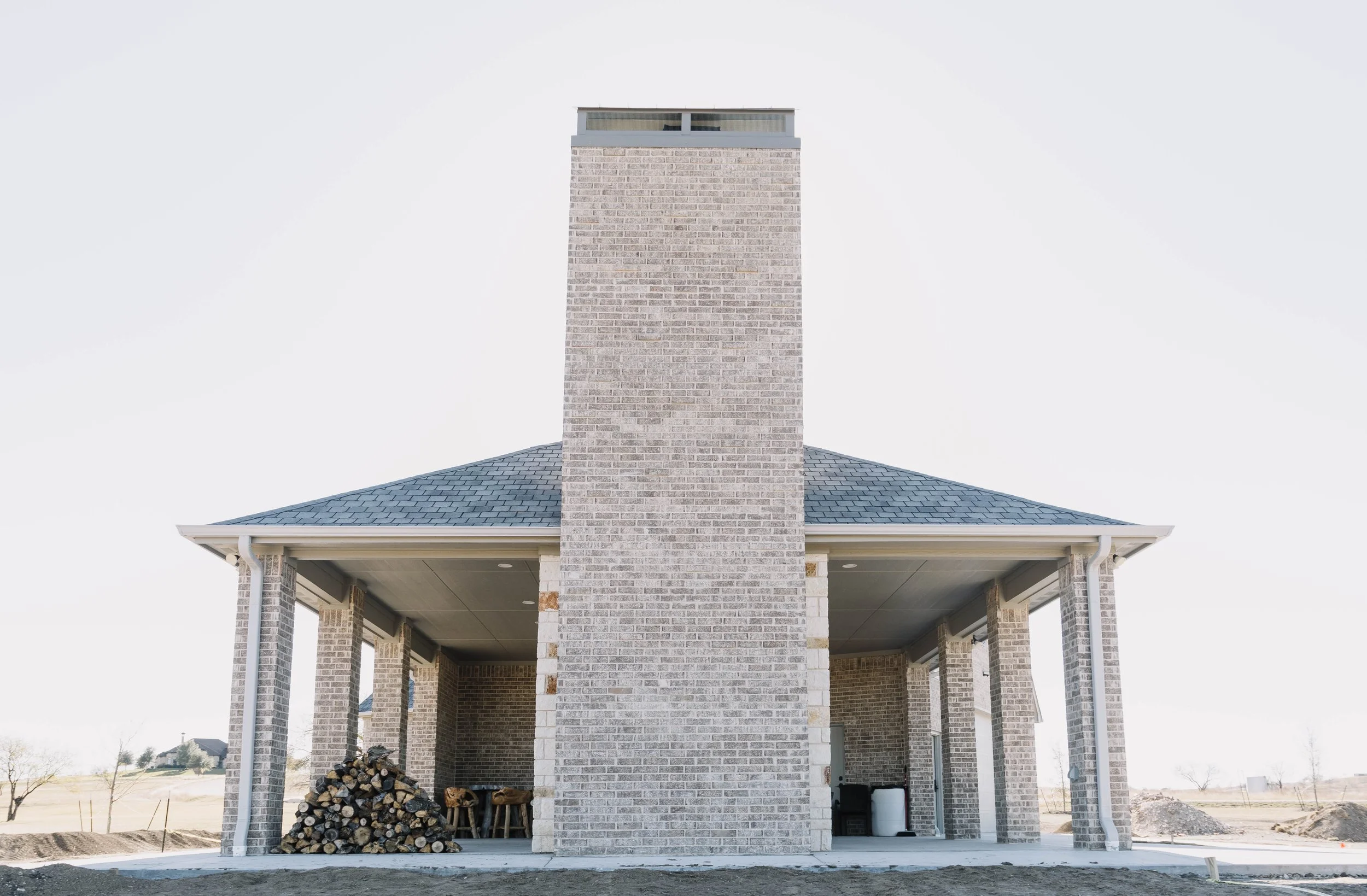 The massive outdoor fireplace build by 6th Ave Construction team