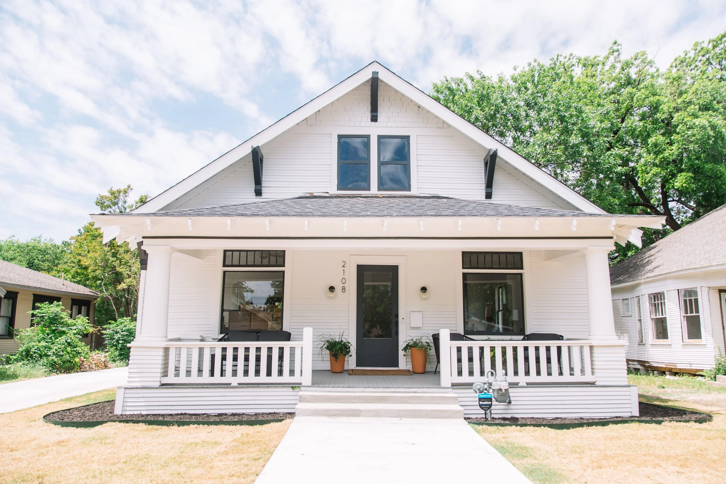 Wide Front look of 5th Ave Home remodeled by 6th Ave Homes