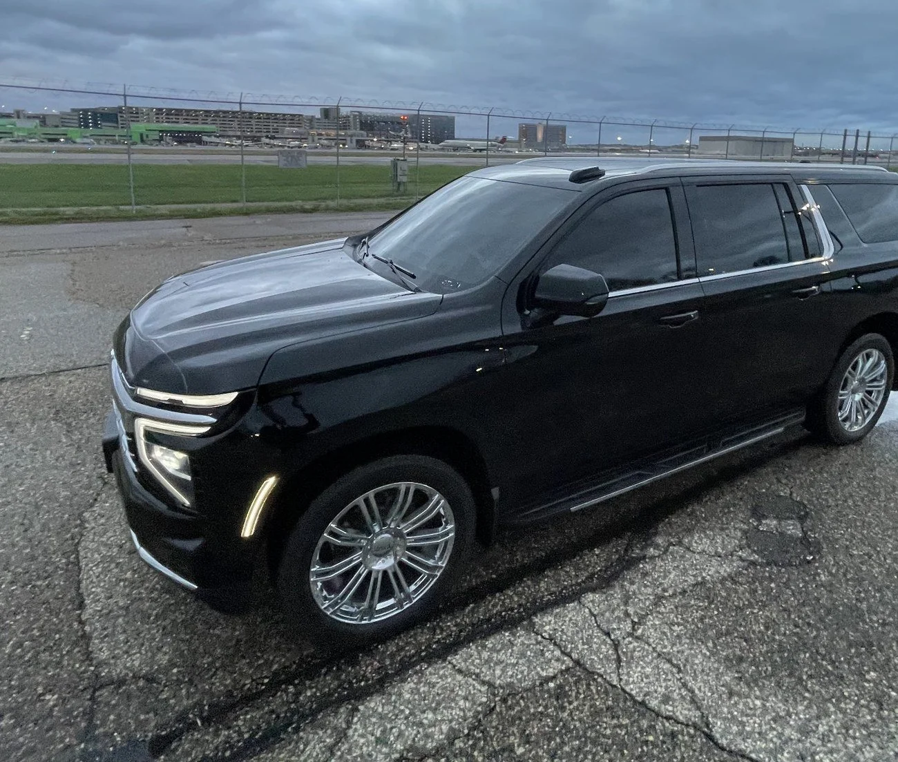 For Sure Luxury 2025 Limo Custom Suburban beside the MSP Airport airfield, a short drive from Eagan