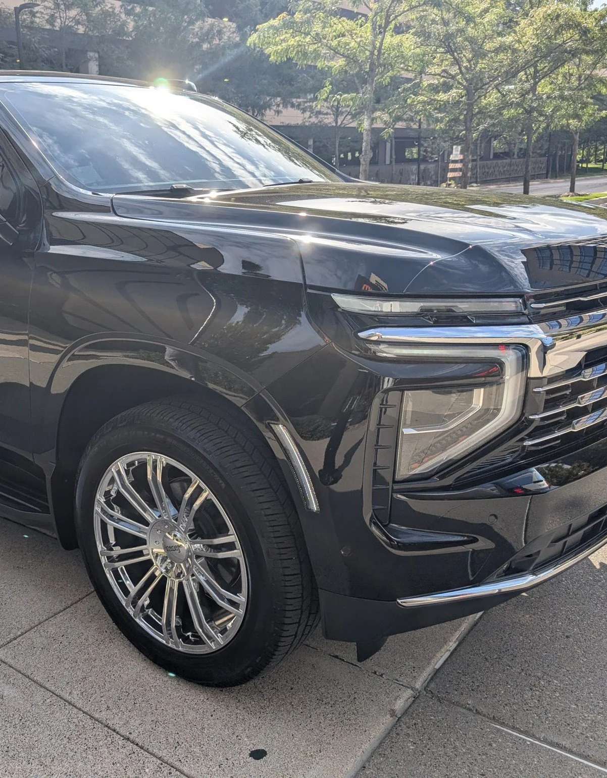 For Sure Luxury 2025 Limo Custom Suburban at the MSP Airport parking ramp for a commercial flight pickup