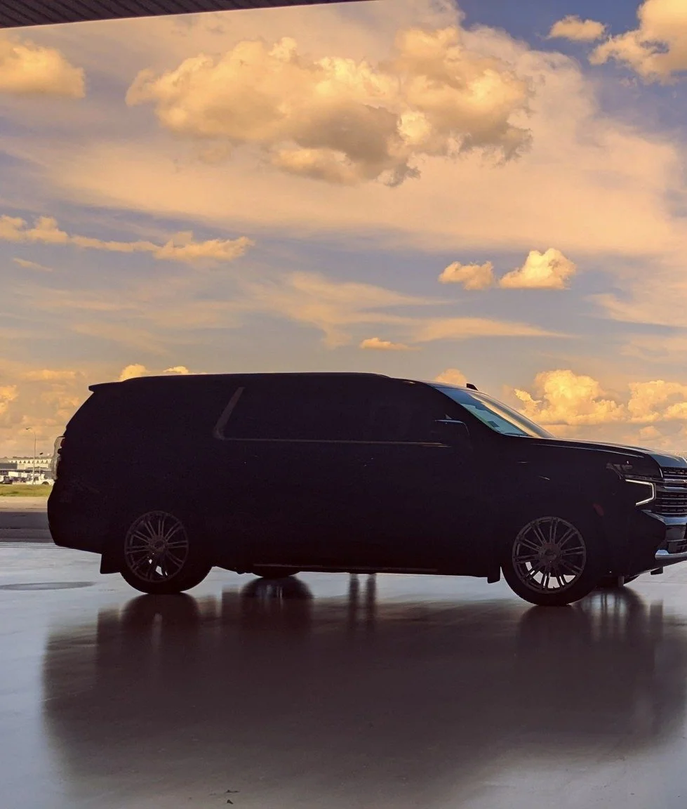 Chauffeured Suburban at sunset near Flying Cloud Airport for a Chanhassen pickup