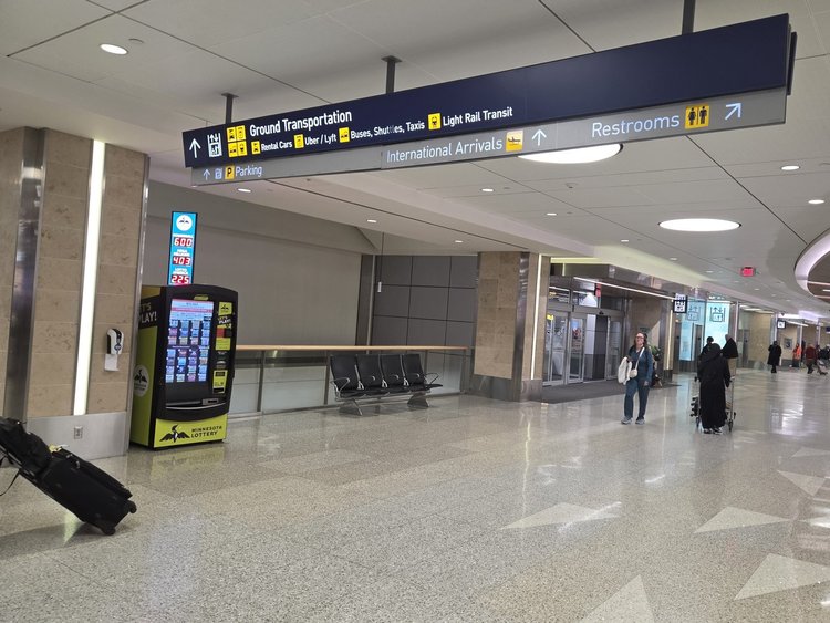 Ground Transportation signs at MSP Airport Terminal 1 baggage claim