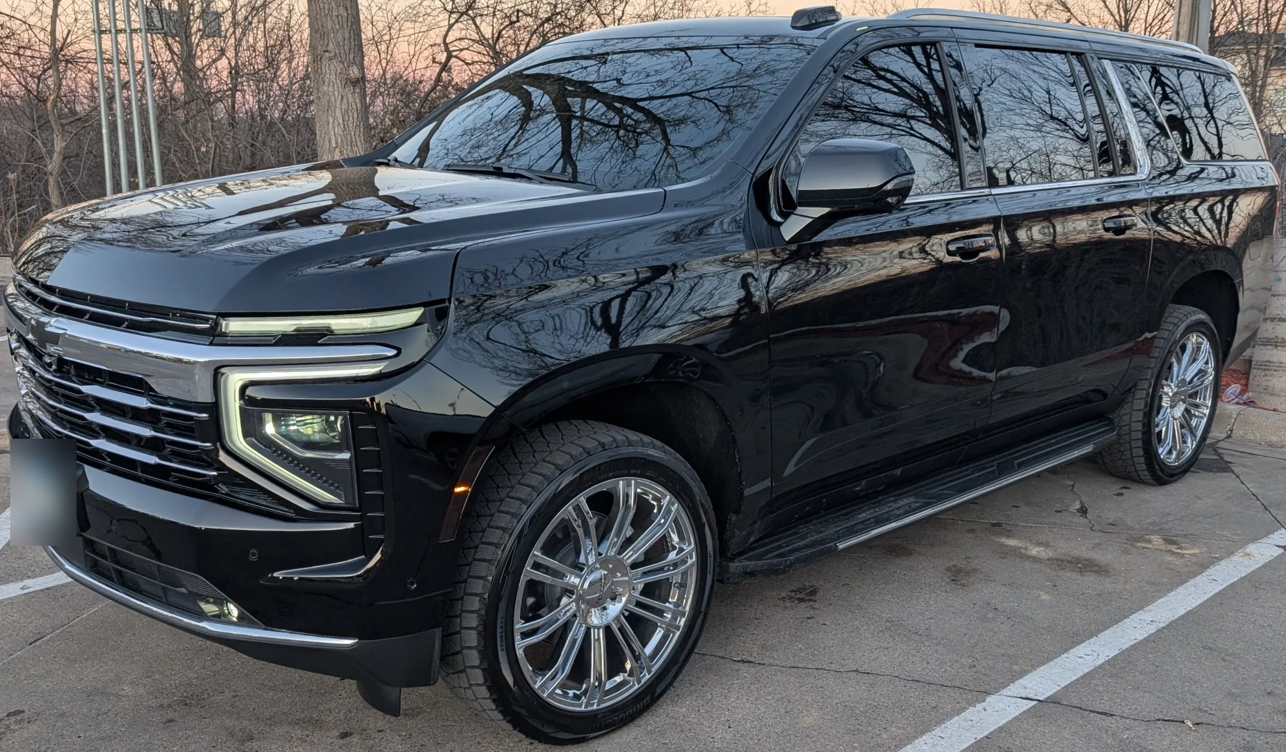 Chauffeured Suburban at sunset ready for a Burnsville car service pickup