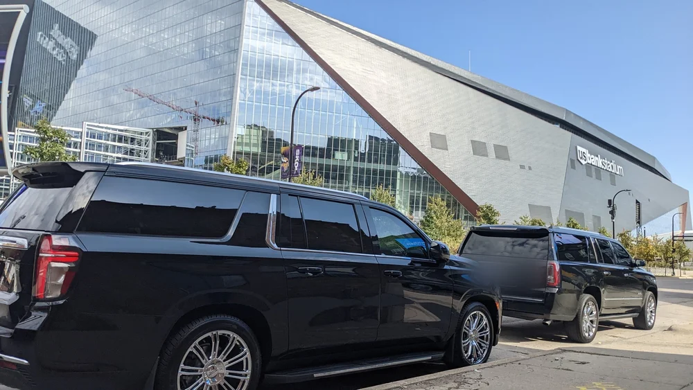 Chauffeured Suburban outside U.S. Bank Stadium on Vikings game day