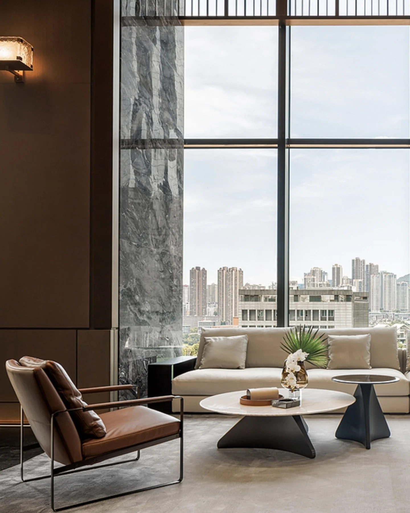 Breathe in calm and sophistication. 

This sleek space blends soft neutrals with bold textures for the perfect urban retreat. 

Loving the mix of leather, marble, and clean lines that make every moment here feel like a getaway.

Products:
#Epic Sofa
