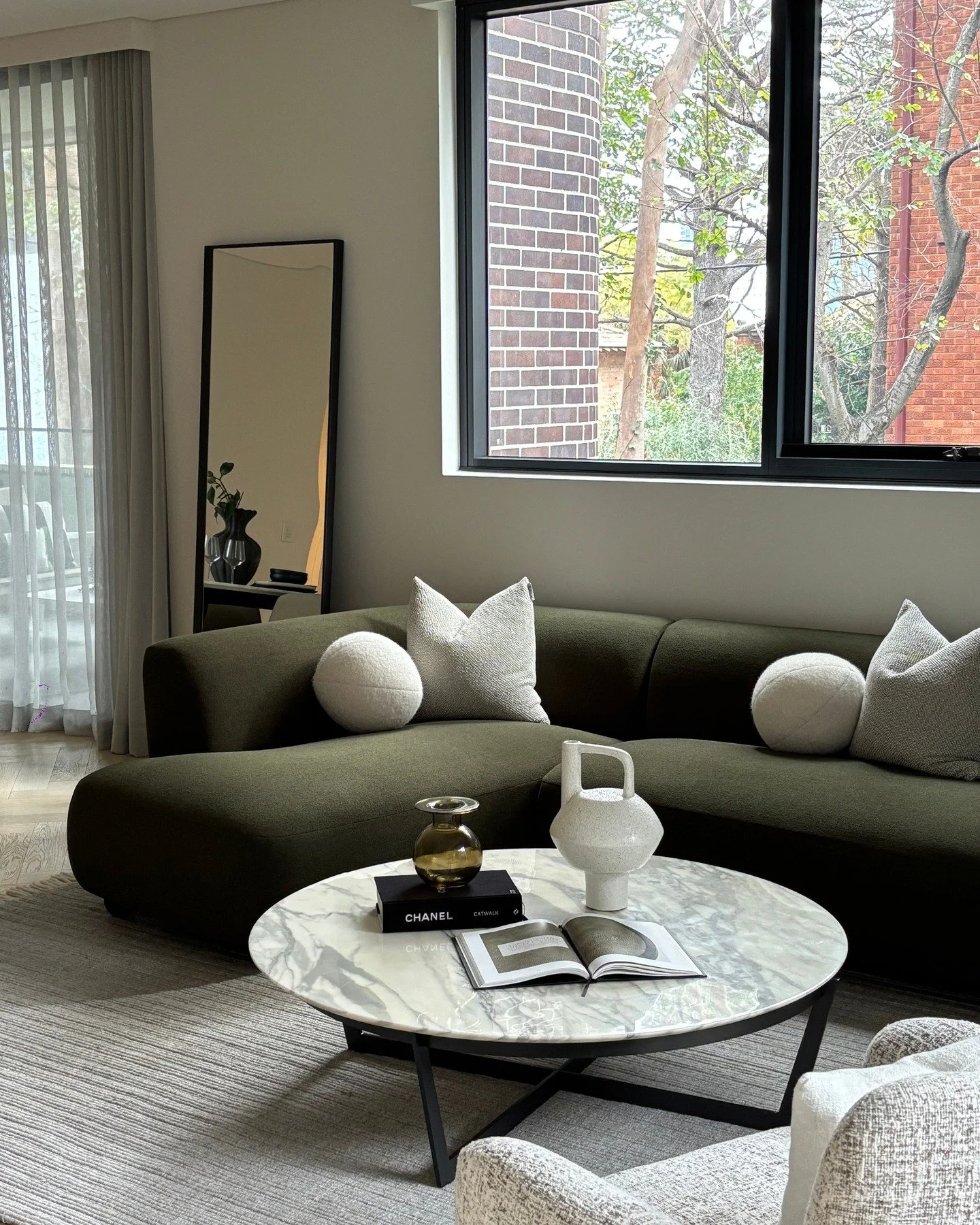 Effortless sophistication in Neutral Bay. 

Our Camerich styling blends sculptural forms, textured fabrics and timeless finishes to create a living space that feels both inviting and refined.