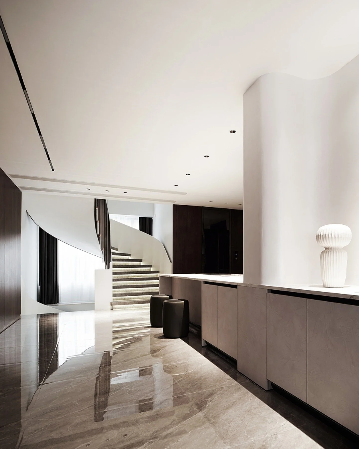 Quiet curves and grounded materials come together in a space designed to breathe, where each piece plays its role without competing for attention.

#Drum Ottoman
#Ballet Dining Chair
#Unity Dining Table
#Austen Chair