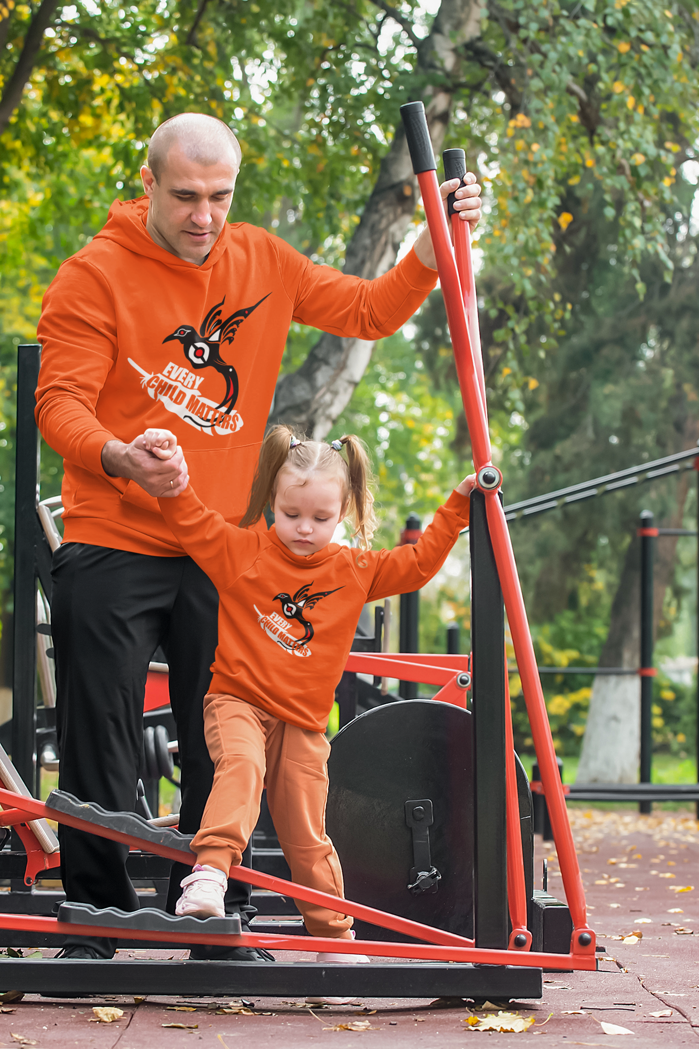2026 Warband Graphics Orange Hoodie Grandpa and Grandaughter park 1.png