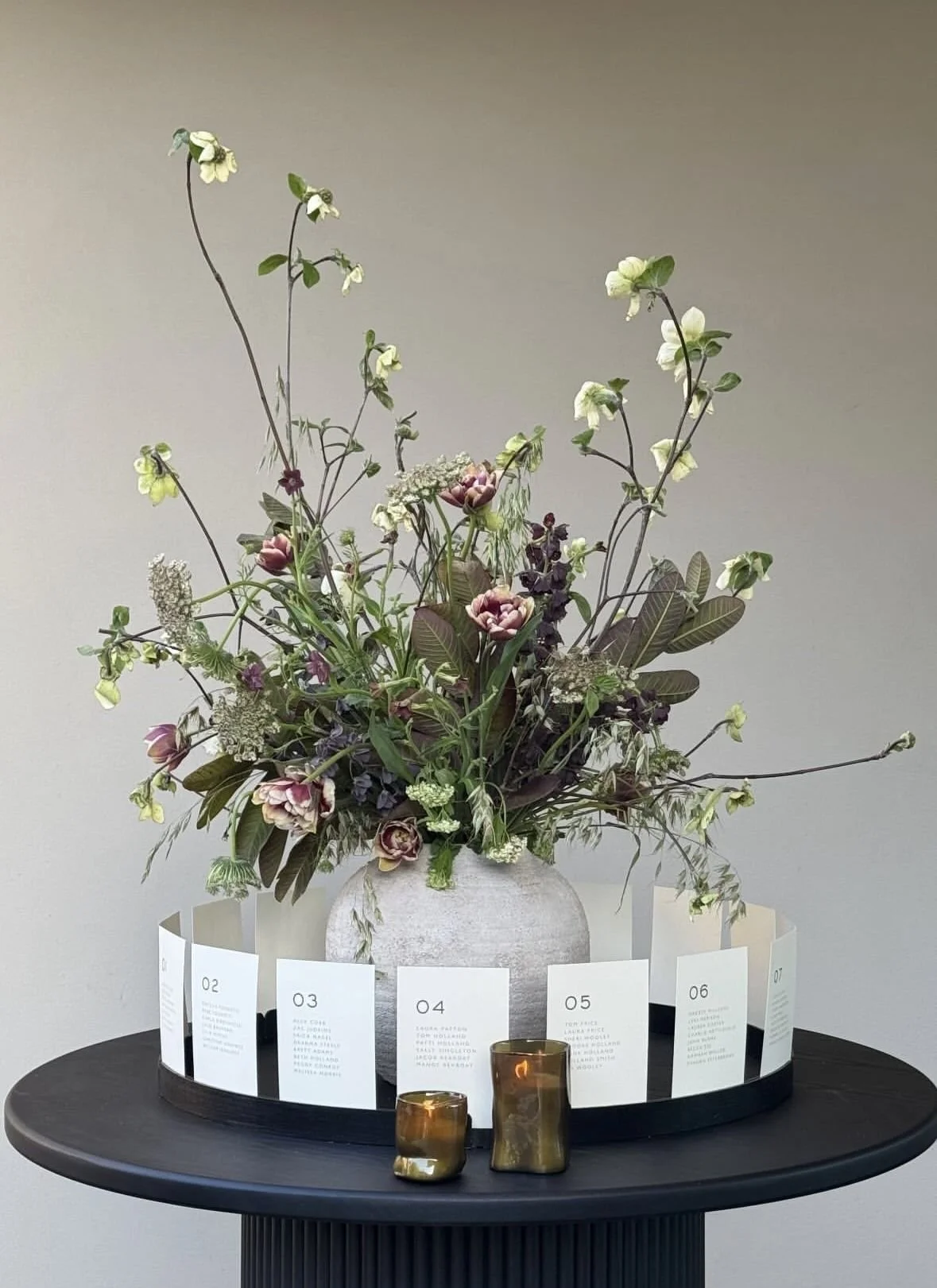 Seating chart by table with large floral - starting at $250