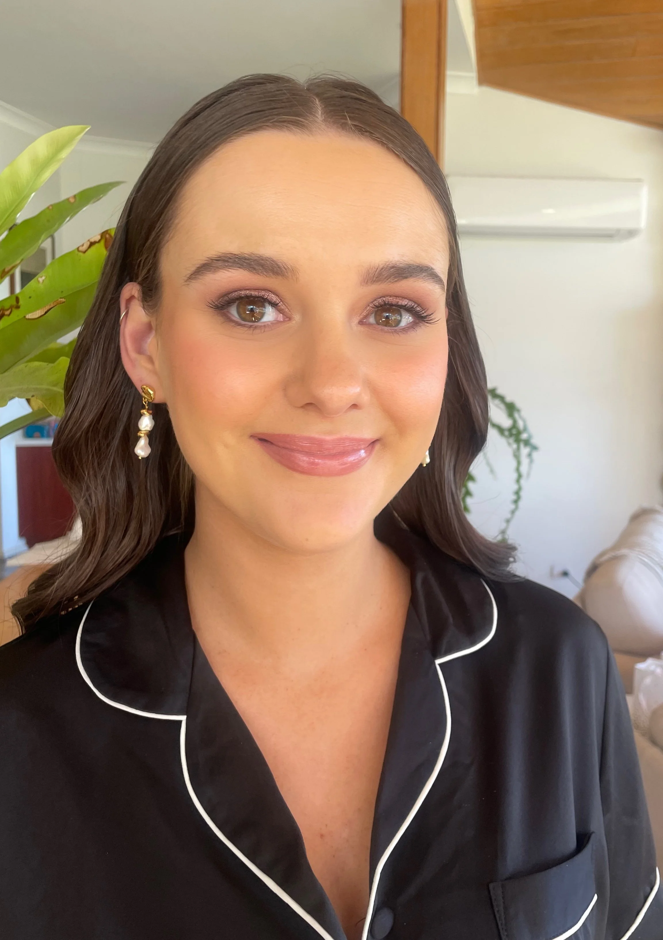 Portrait of a bridesmaid with professional makeup applied