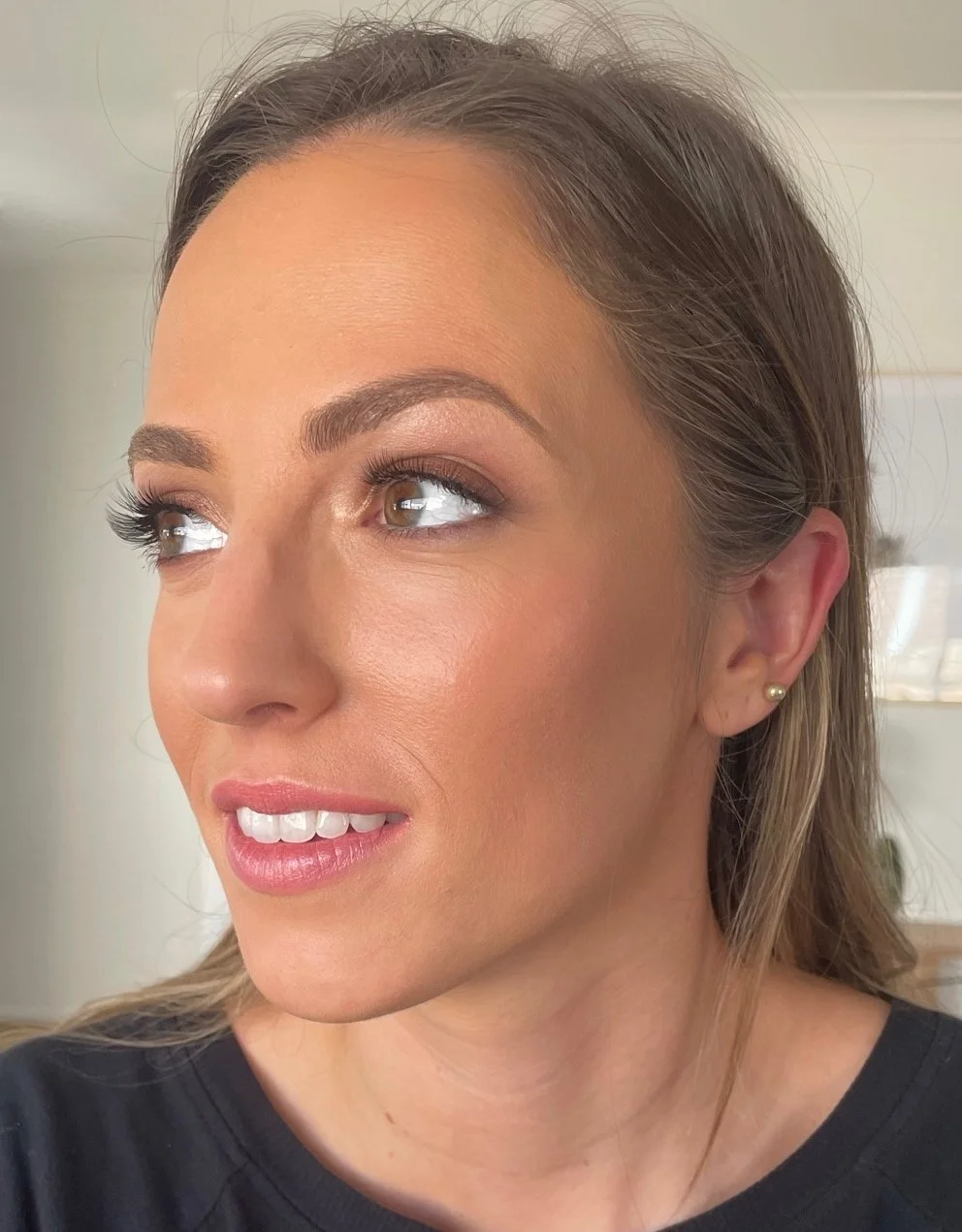 Lightly applied makeup ready for attending special anniversary dinner