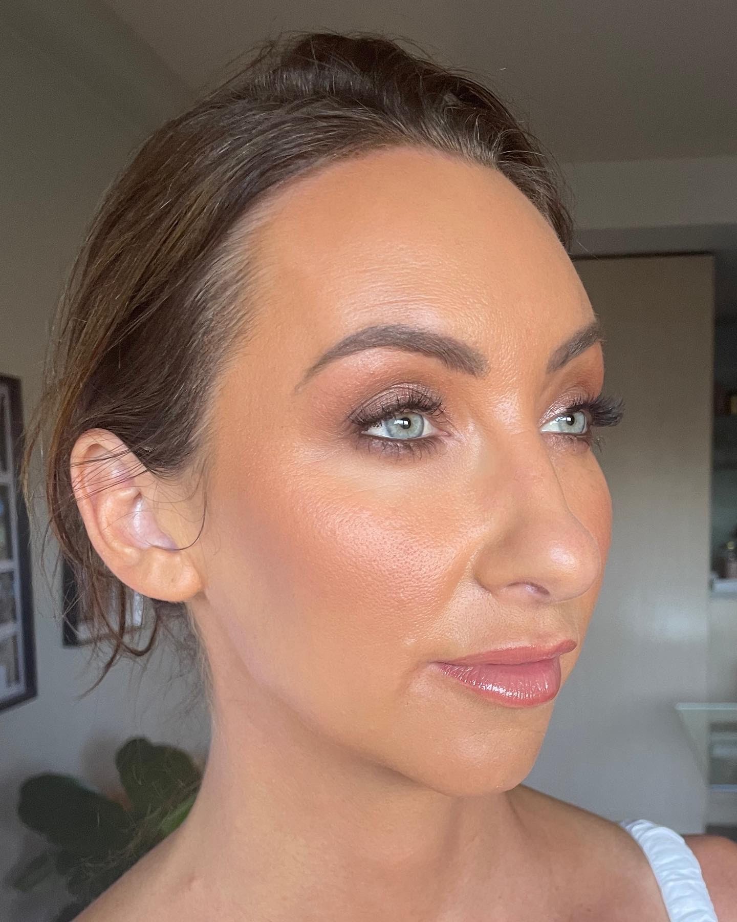 Makeup professionally applied for this TV star, ready for her big event