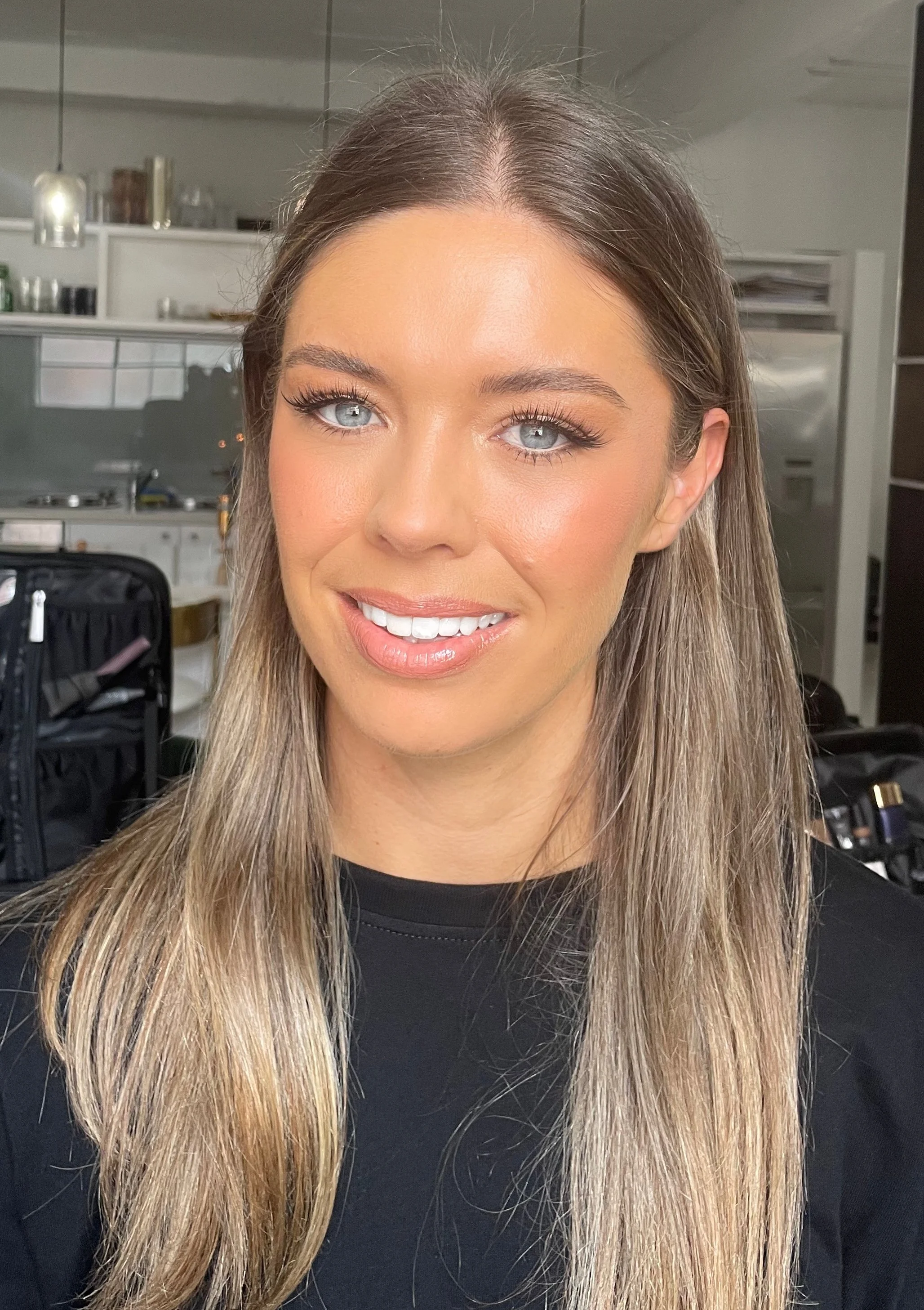 Girl with professionally applied makeup ready for attending her friends birthday party
