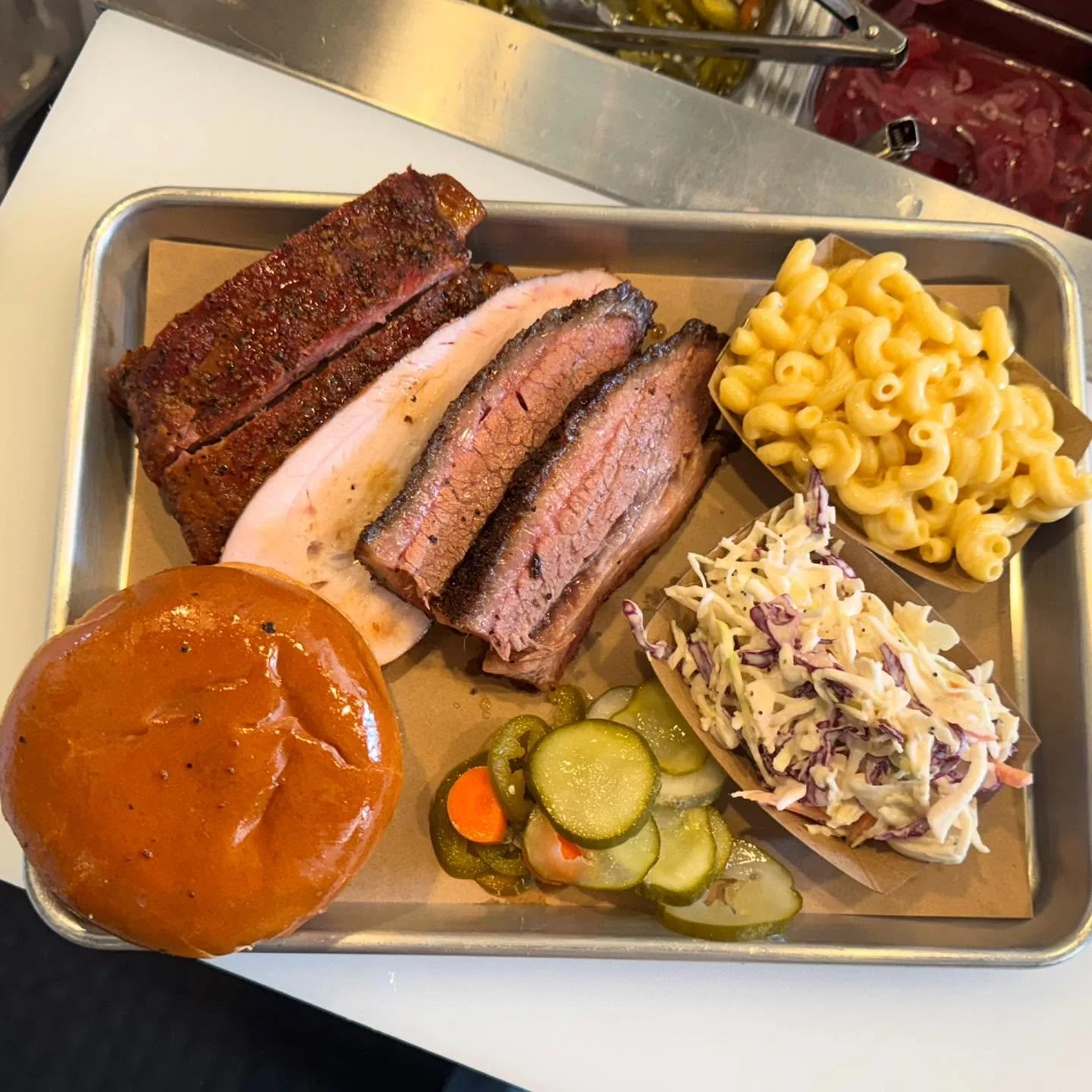 Pictured: 3 Meat Brisket plate with slaw &amp; mac. Add a pulled pork sandwich, dill pickles &amp; peppers

#texasbbq #texasbarbecue #texasbrisket #tmtop10bbq