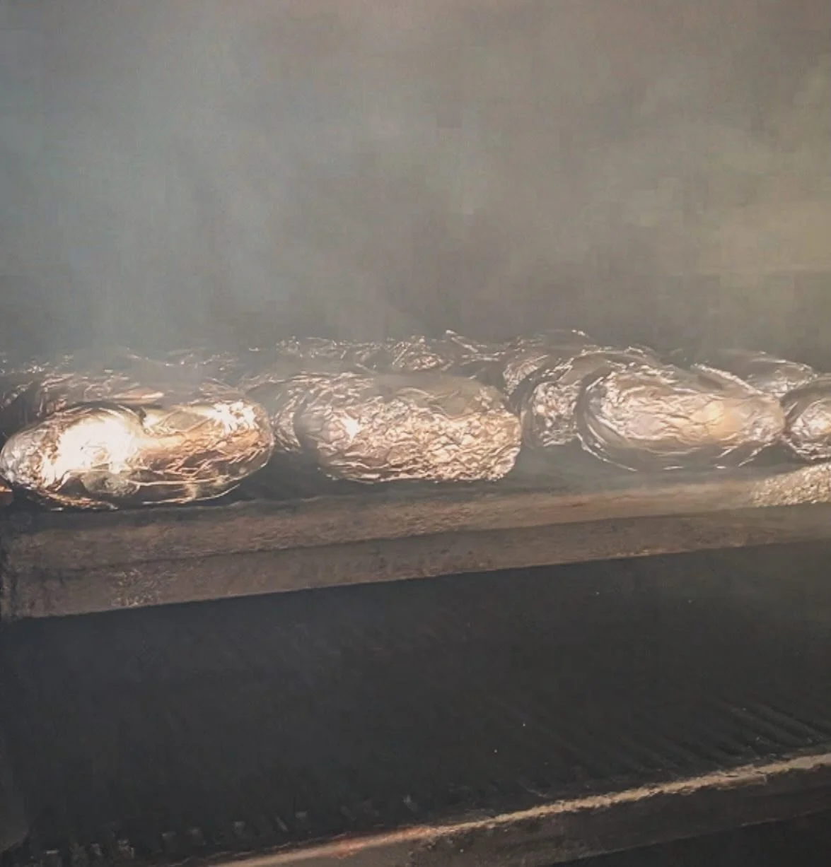 DID YOU KNOW WE SMOKE OUR POTATOES? Every Sunday we throw them up on the top shelf of the pit(67 today) to smoke in their foil. We don&rsquo;t tend to think they get much flavor because they are wrapped, but some swear it makes them better. 

NO POTA