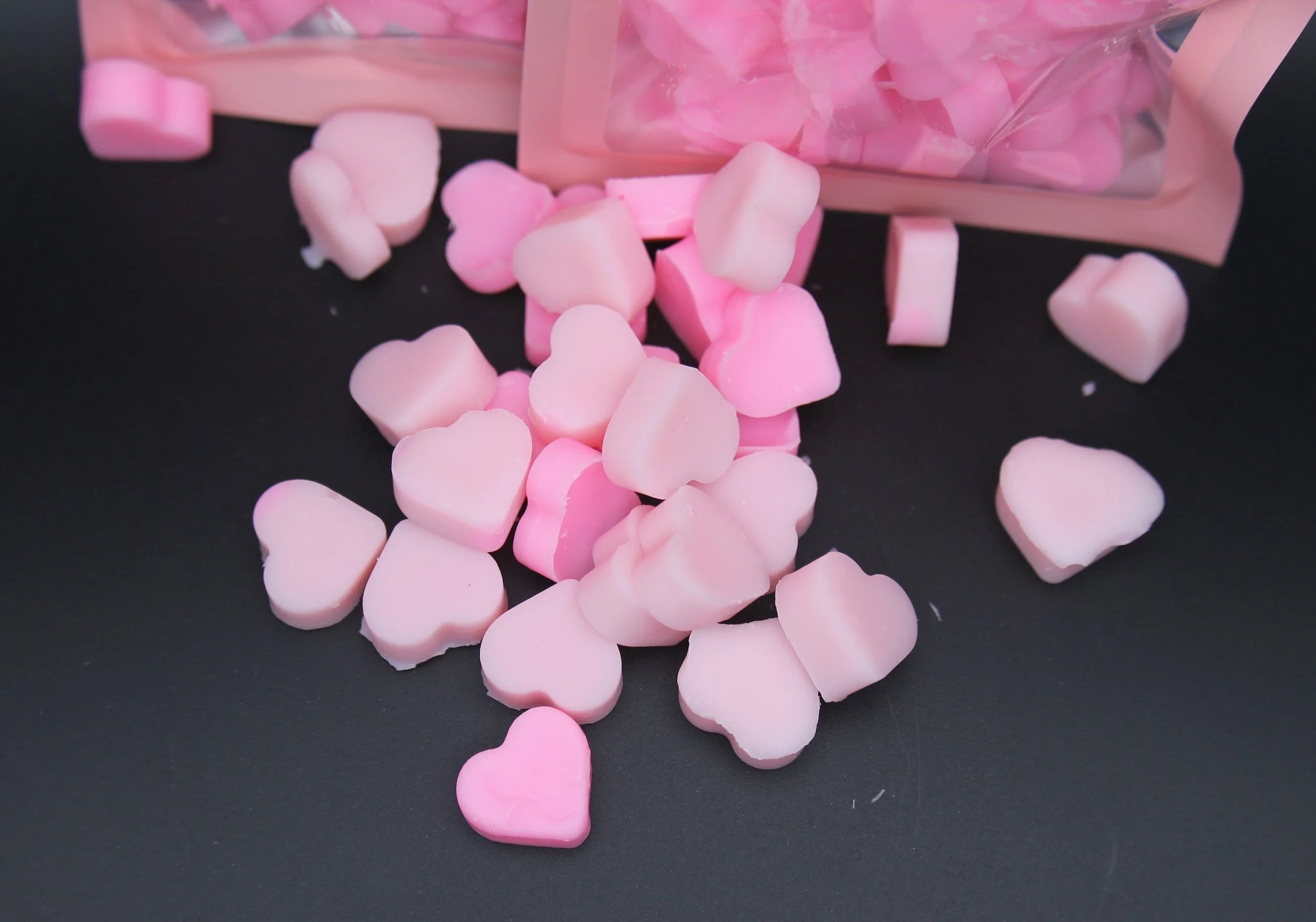 Mini heart-shaped wax melts available in six scents, perfect for creating a romantic Valentine’s ambiance or as a charming self-care treat.