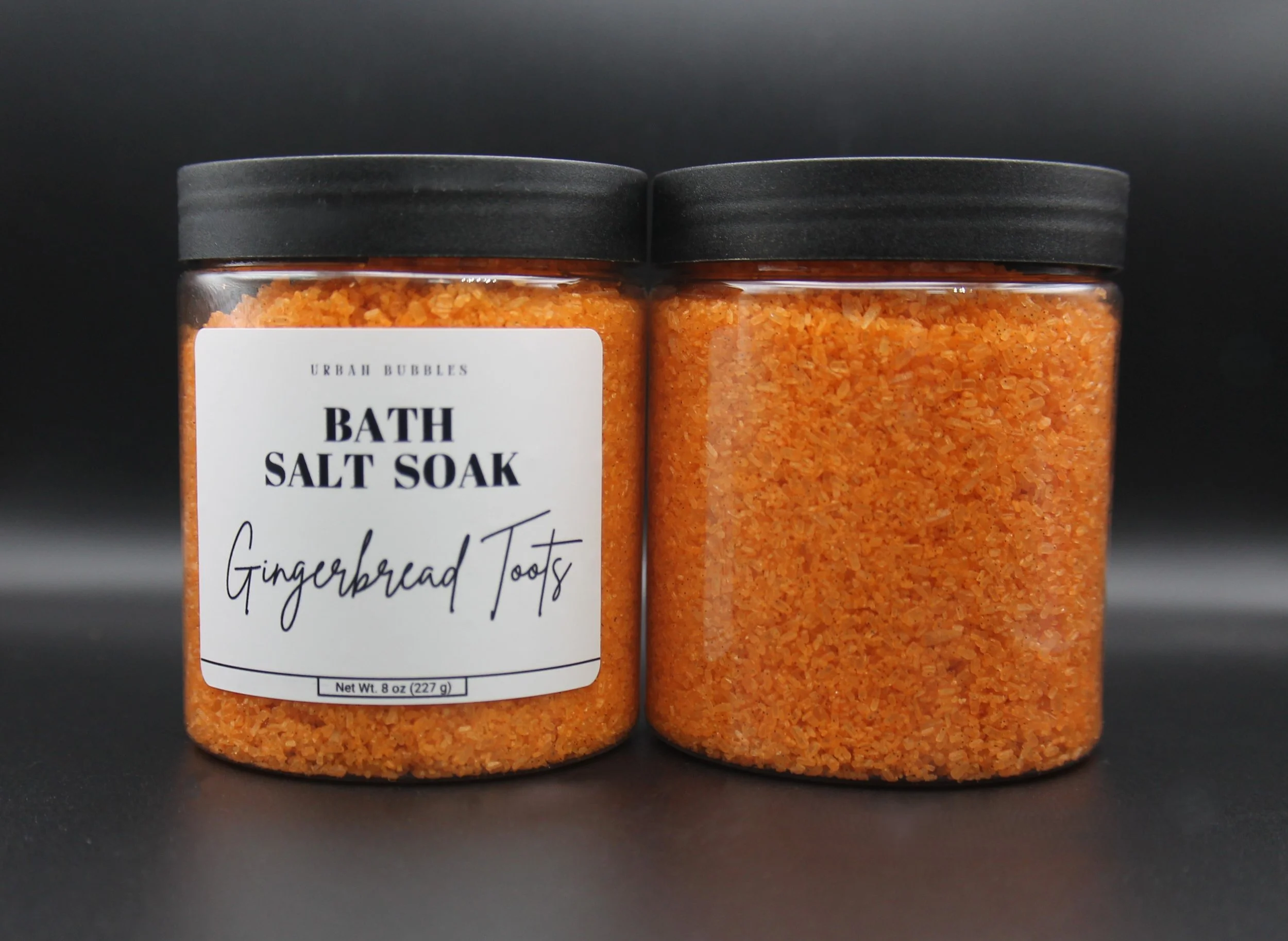 Gingerbread Toots Bath Salts in soft golden hues, infused with the warm and spicy aroma of butter, cinnamon, clove, nutmeg, and vanilla, perfect for a relaxing holiday bath.