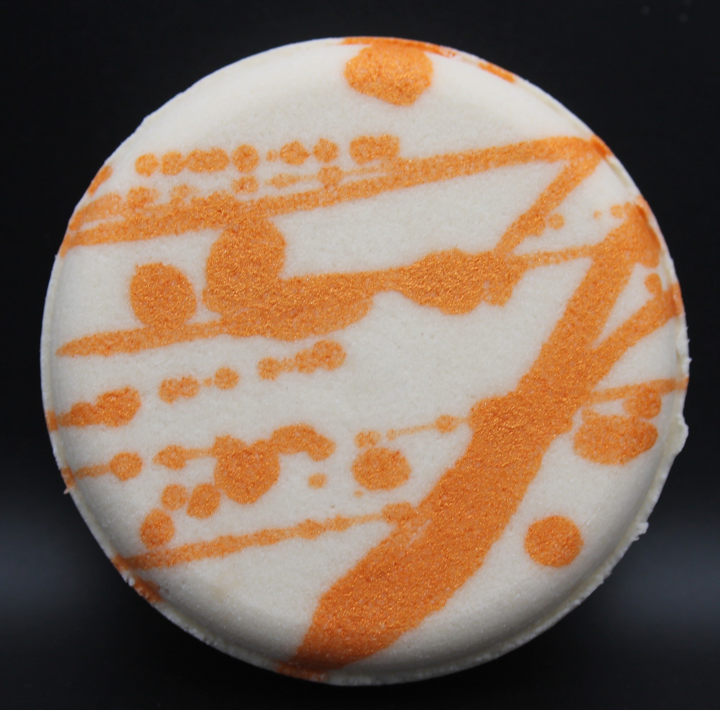 Gingerbread Toots Shower Steamer with a cozy fragrance of butter, almond, cinnamon, clove, nutmeg, vanilla, and tonka bean, perfect for a festive shower experience.