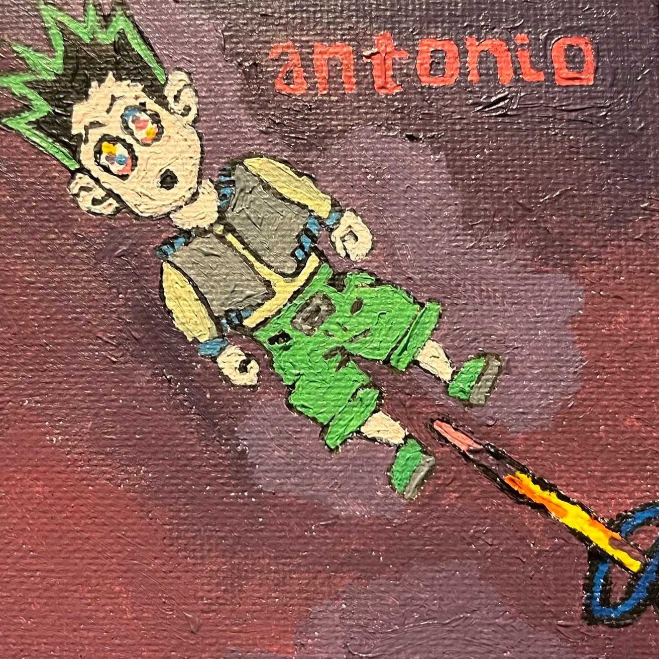 A colorful hand-painted depiction of a cartoon character with spiky green hair, large expressive eyes, wearing a gray vest, yellow sleeves, green shorts, and holding a long stick with a flame at the end. The background is dark maroon with the word 'a