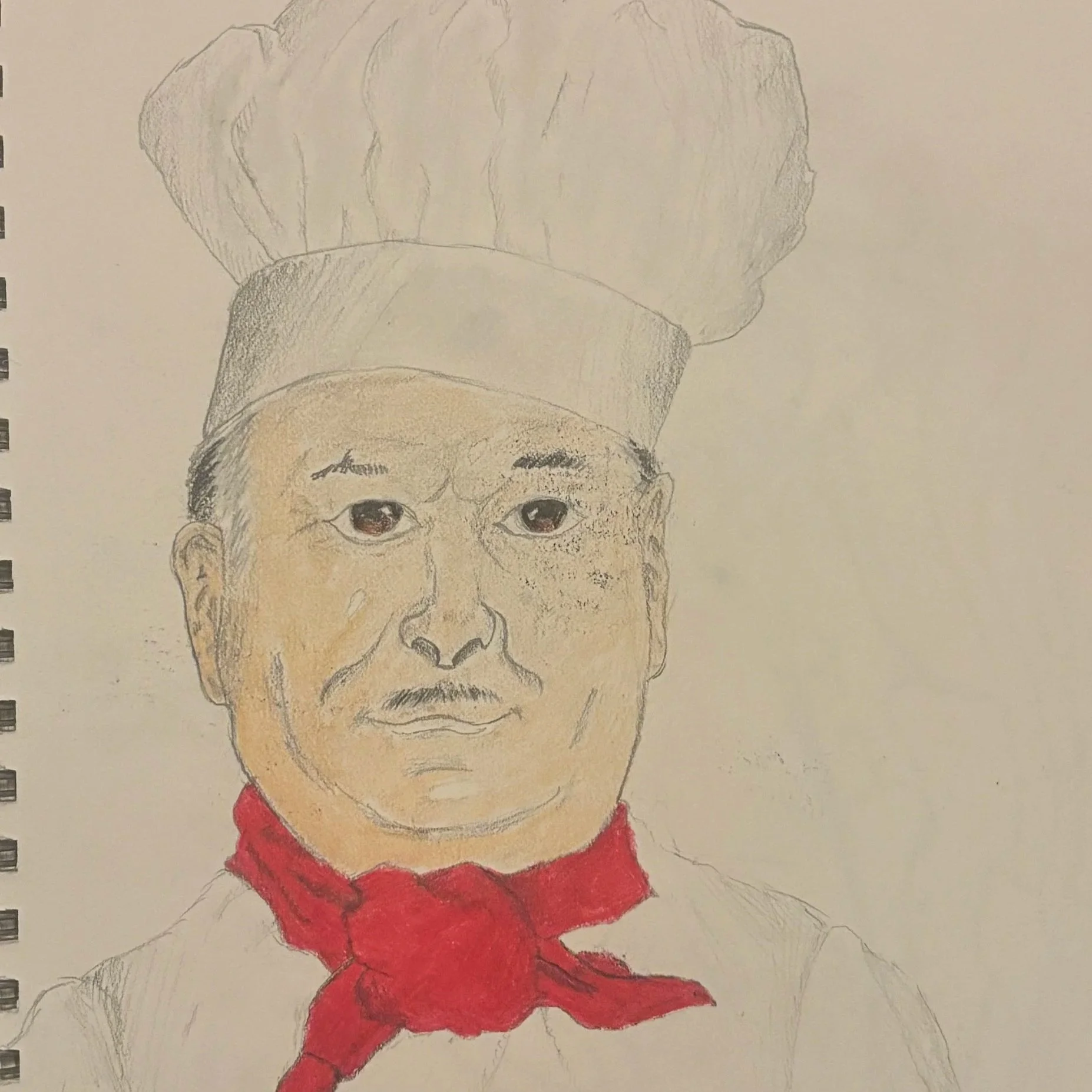 A colored pencil drawing of a chef with a gray chef hat, a red neckerchief, and a neutral facial expression.
