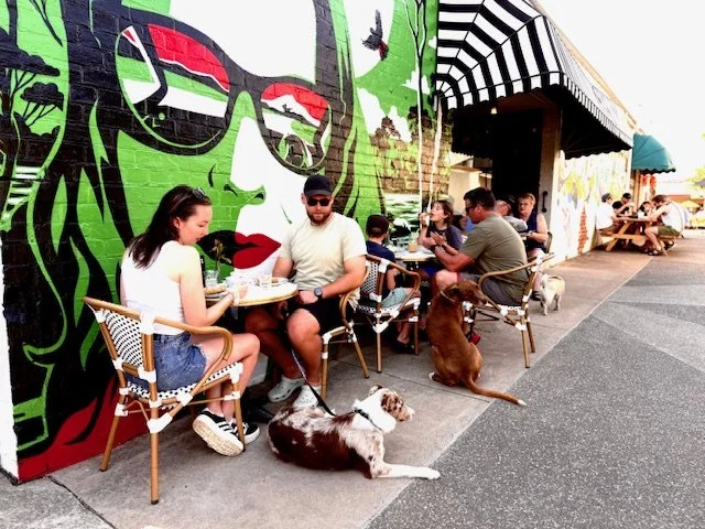 front of cafe - with dog.jpg