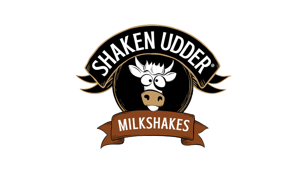 Logo for Shaken Udder Milkshakes featuring a cartoon cow's head with glasses and a banner reading Milkshakes.
