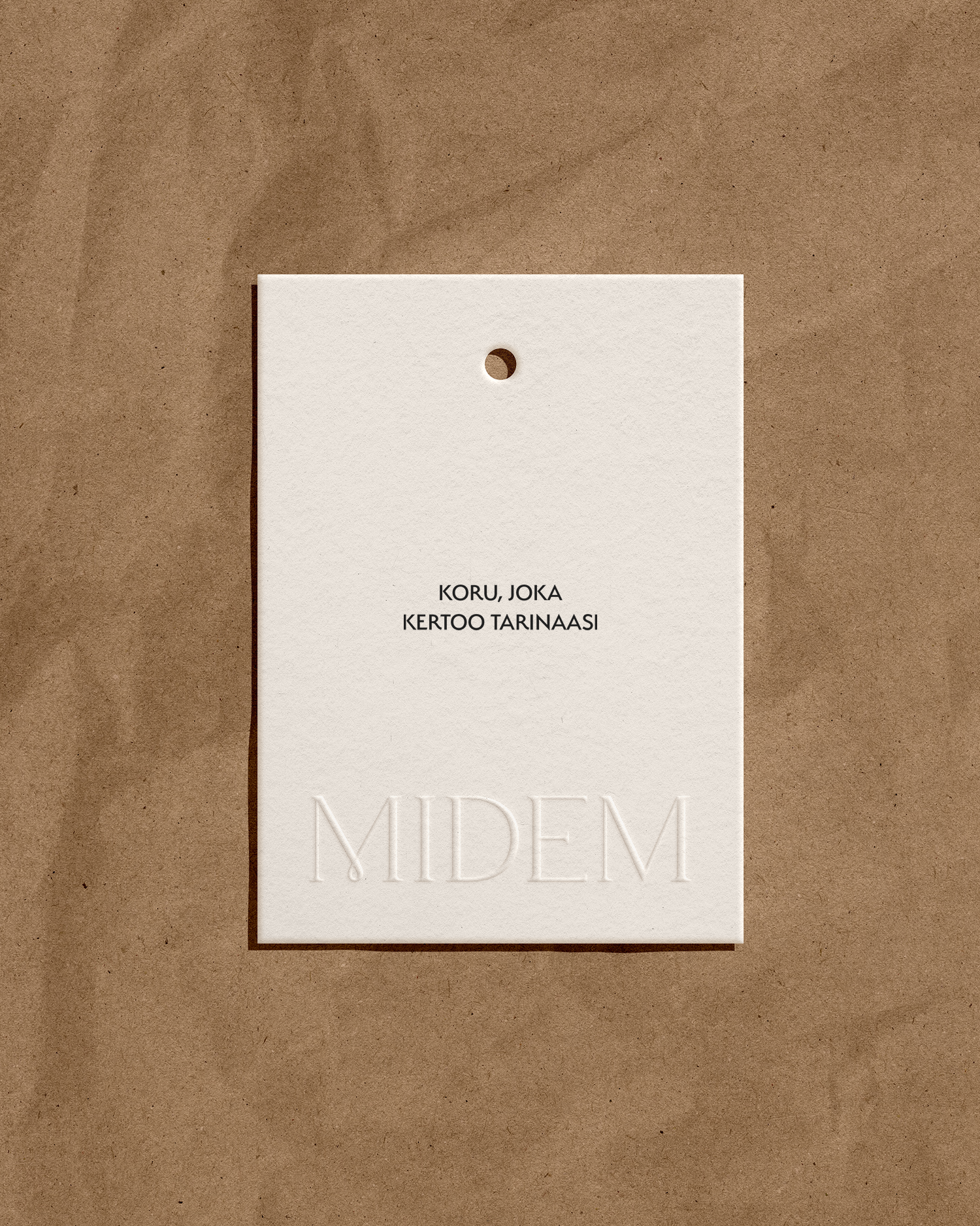 Tuomi Designs_brändisuunnittelu_Midem_etiketti.png