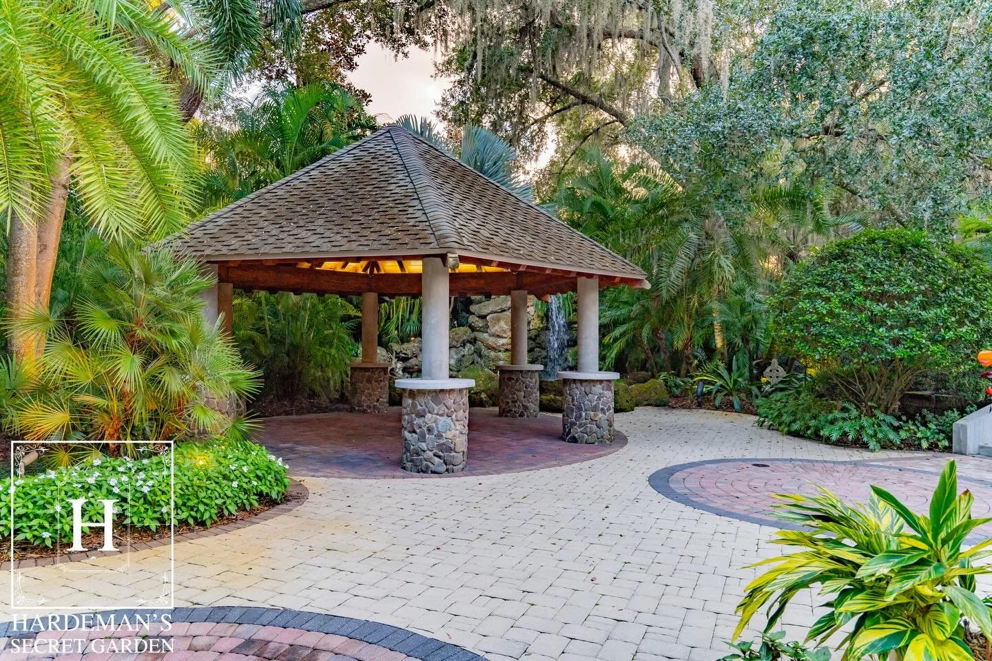 Lush greenery, a flowing waterfall into a koi pond, and a charming gazebo come together to create one of the most memorable spaces at Hardeman&rsquo;s Secret Garden. The Tropical Garden.

www.hardemanssecretgarden.com
#hardemanssecretgarden #weddings