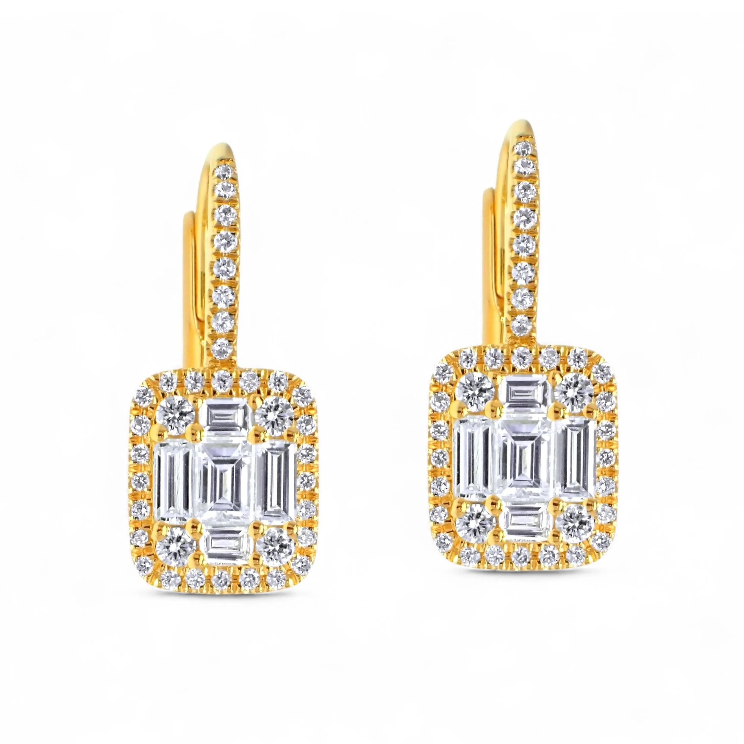 Close-up of 18K yellow gold illusion cluster drop earrings with baguette and round diamonds and a halo design