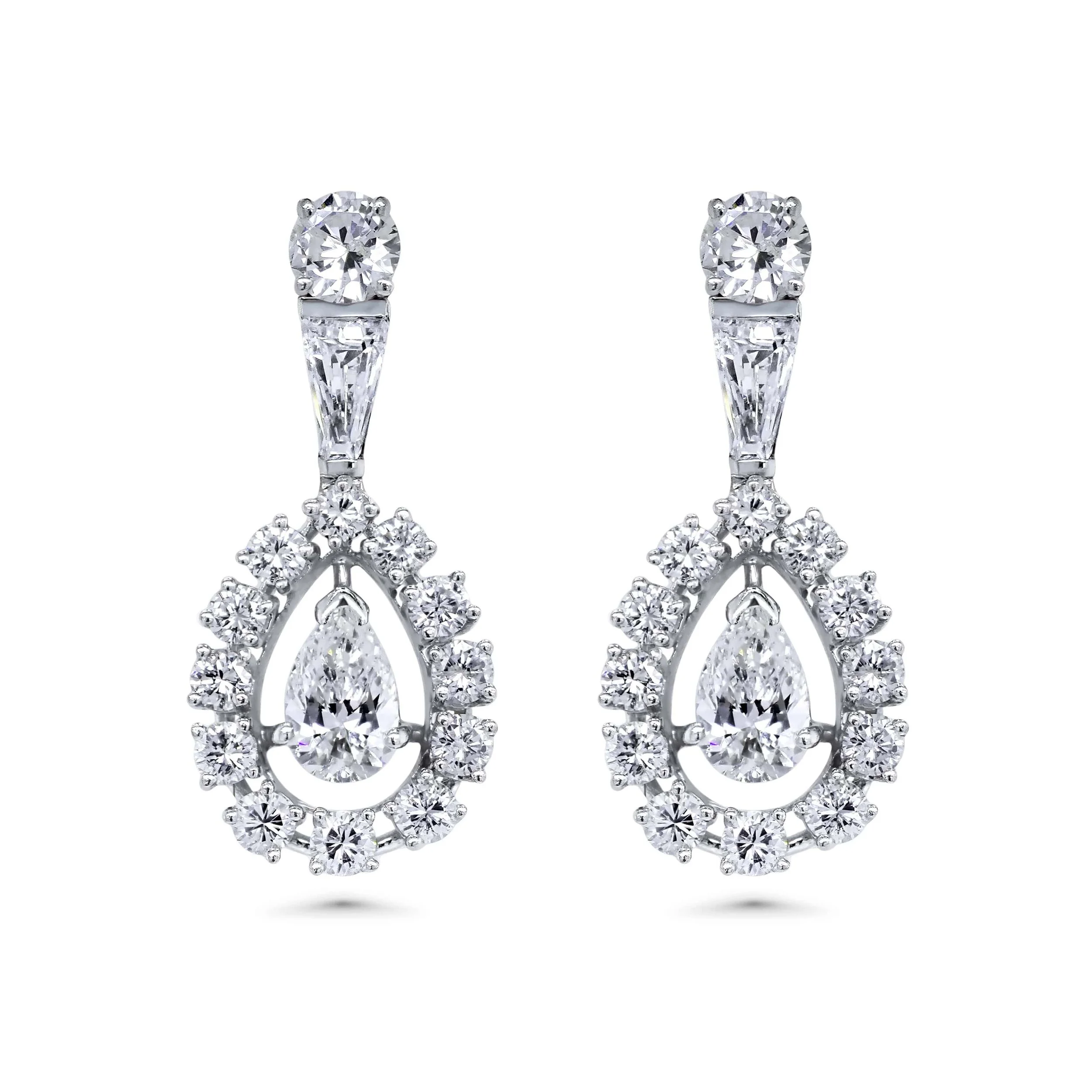 14K white gold pear diamond drop earrings with floating pear center, tapered baguette top, and round diamond halo.