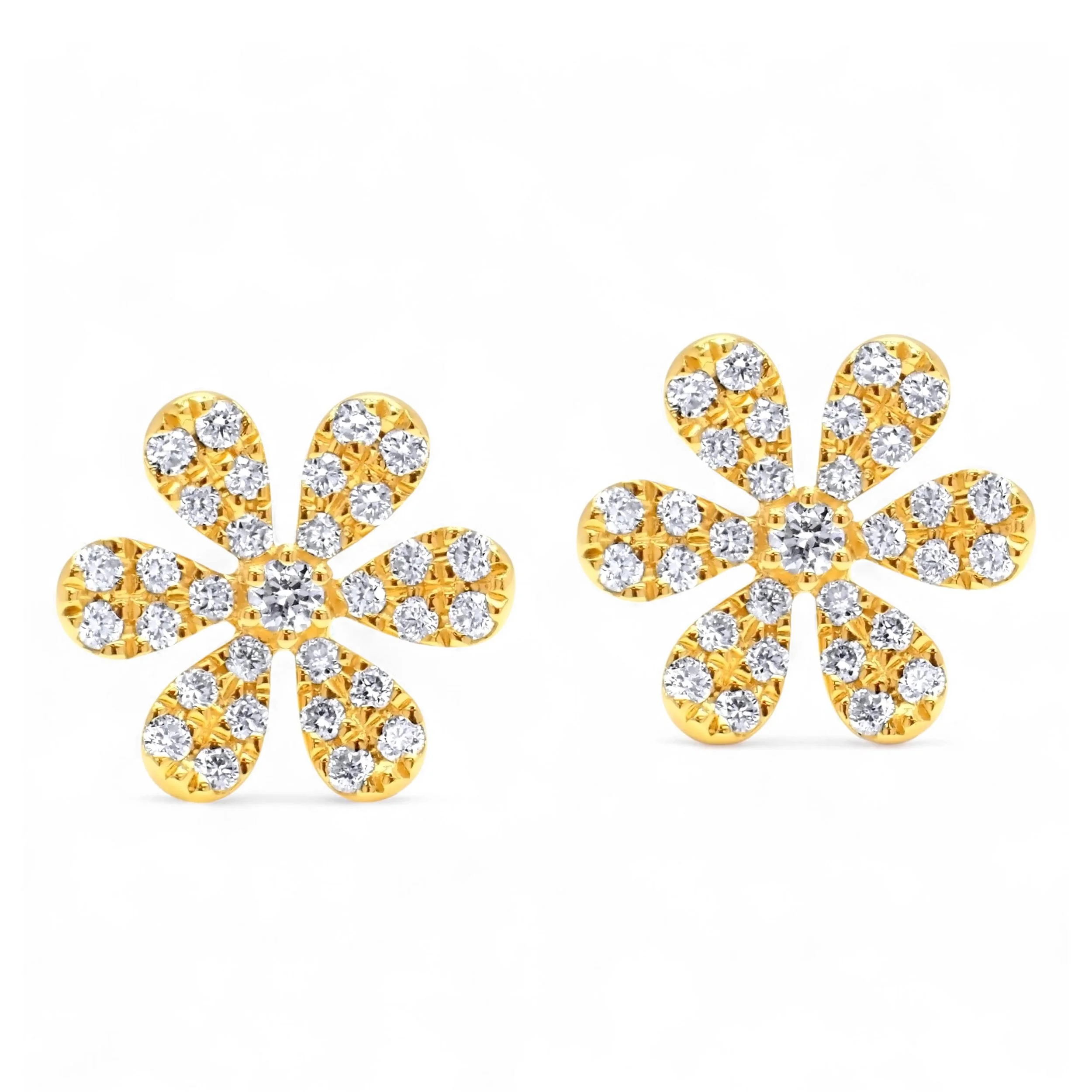 Close-up of 18K yellow gold diamond flower stud earrings showing pavé petals
