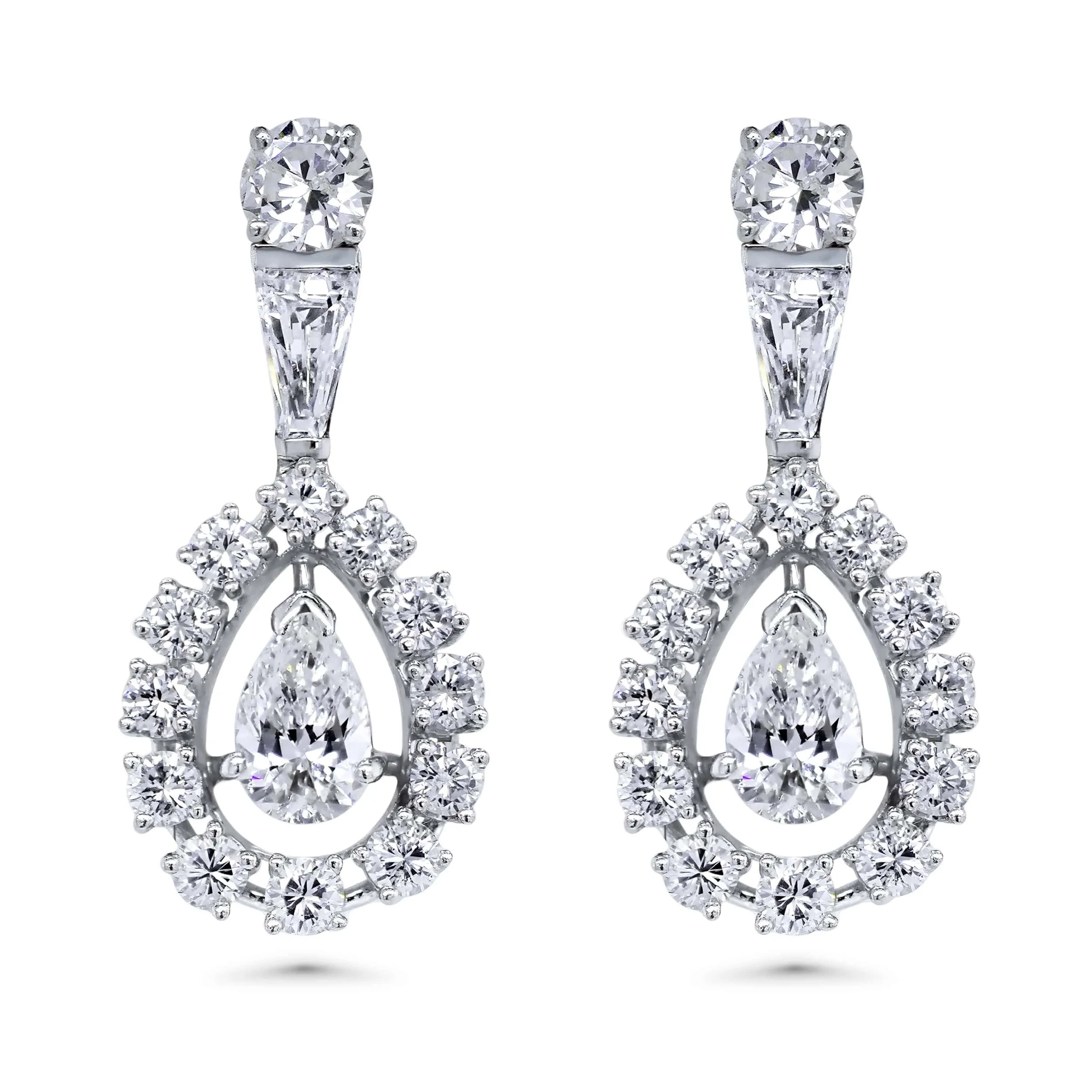 14K white gold pear diamond drop earrings with floating pear center, tapered baguette top, and round diamond halo.