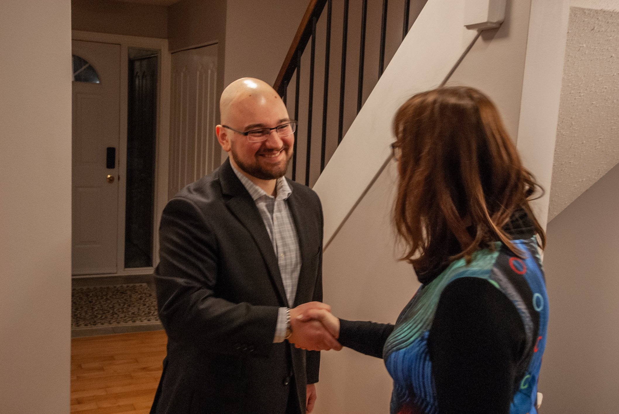 Chris Fliesser meeting with clients during a financial planning consultation