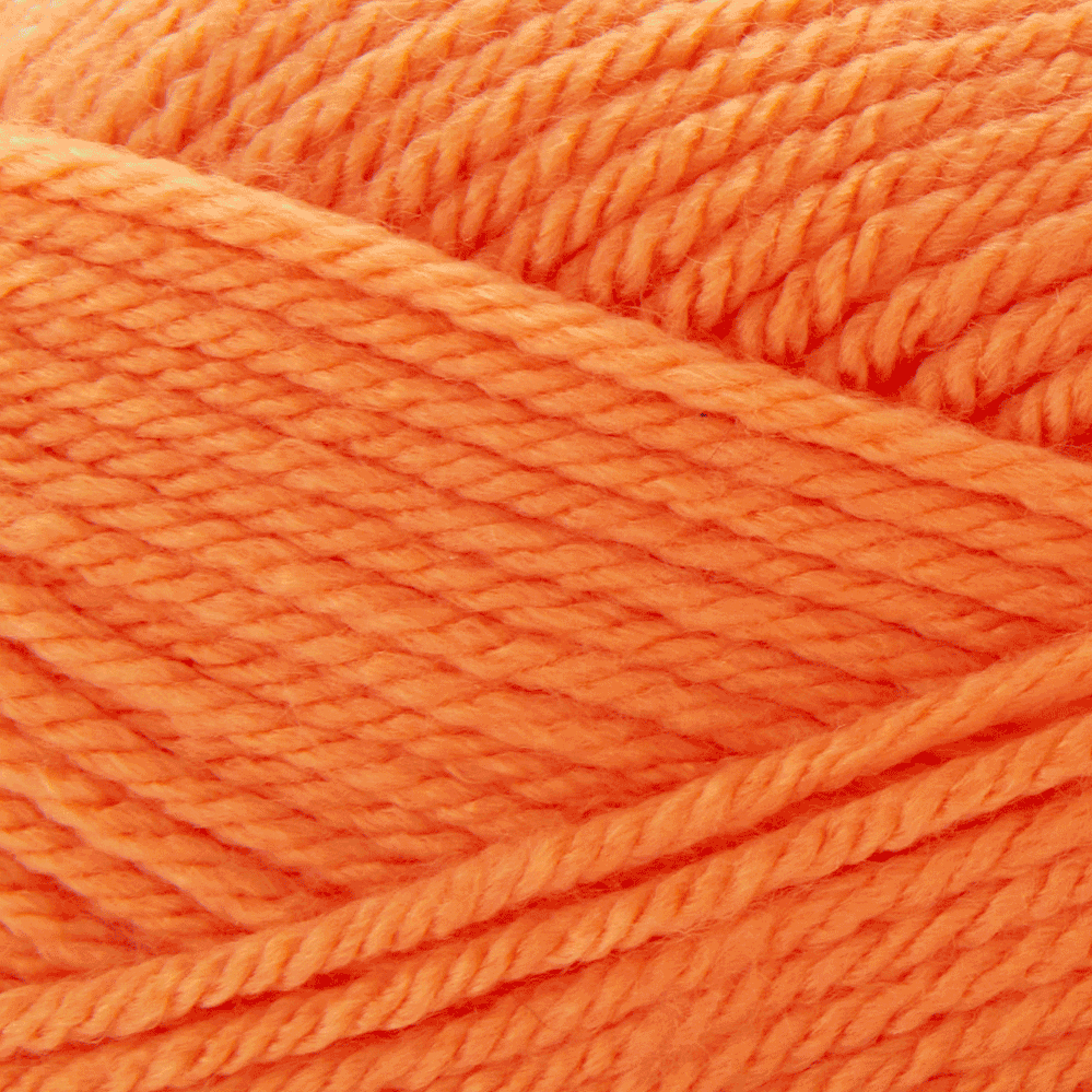 Close-up of yarn with a twisted texture changing colors.