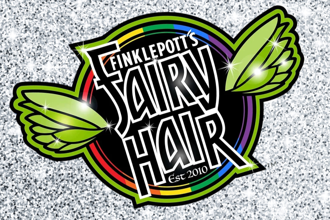 Colorful logo for Finklepott's Fairy Hair, established in 2010, featuring fairy wings on each side of a circular rainbow outline, set against a glittery silver background.