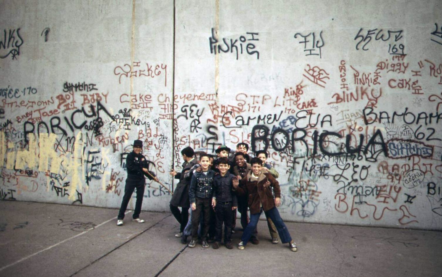 A Bronx sidewalk becomes a makeshift playground for children, 1970s