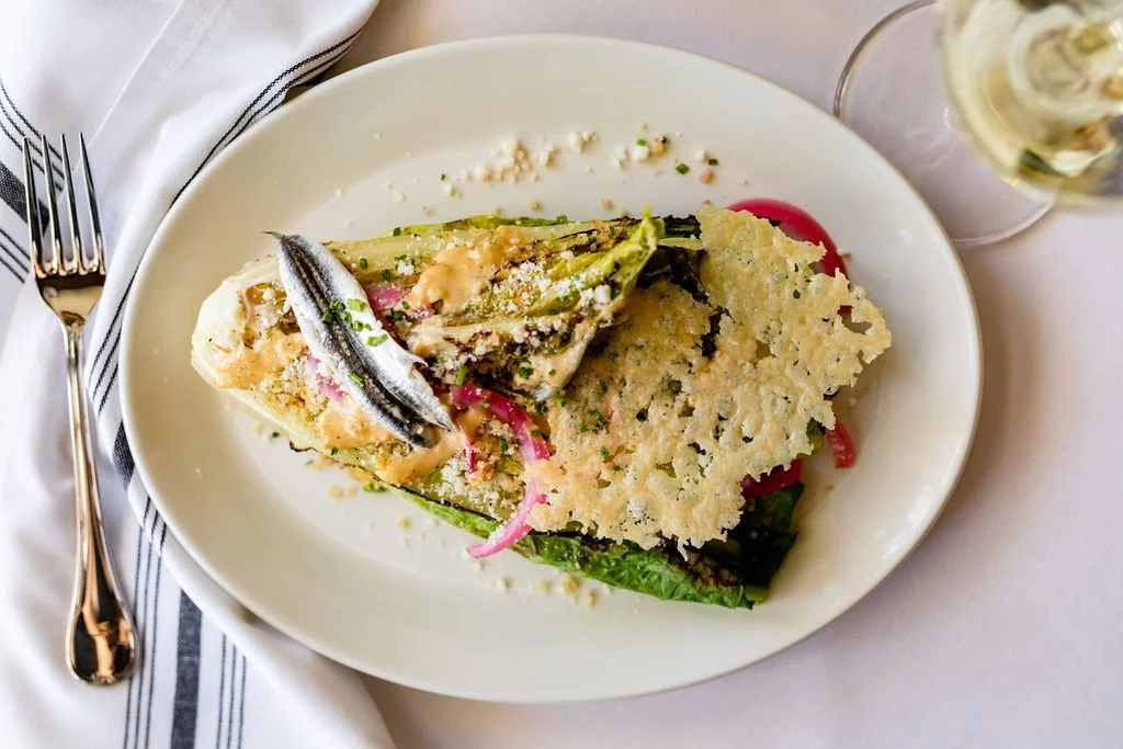 Lulu's signaturer grilled caesar with homemade parmesan crisp