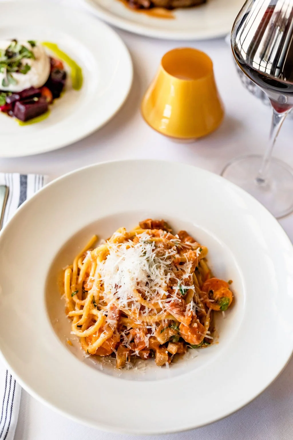 fresh pasta topped with parmesan cheese