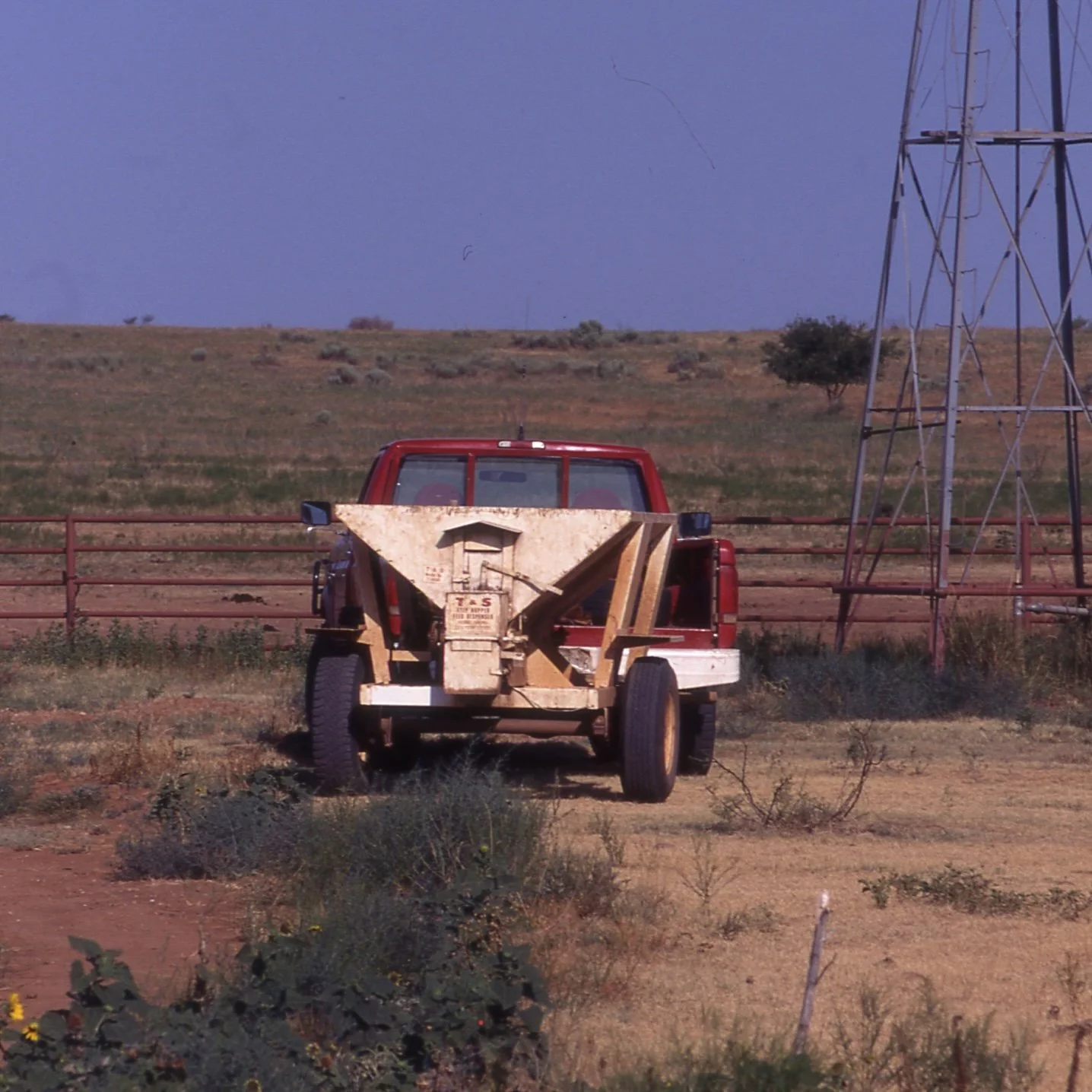 Trip Hopper feeder being used at the 6666 Ranch in the 1980s.