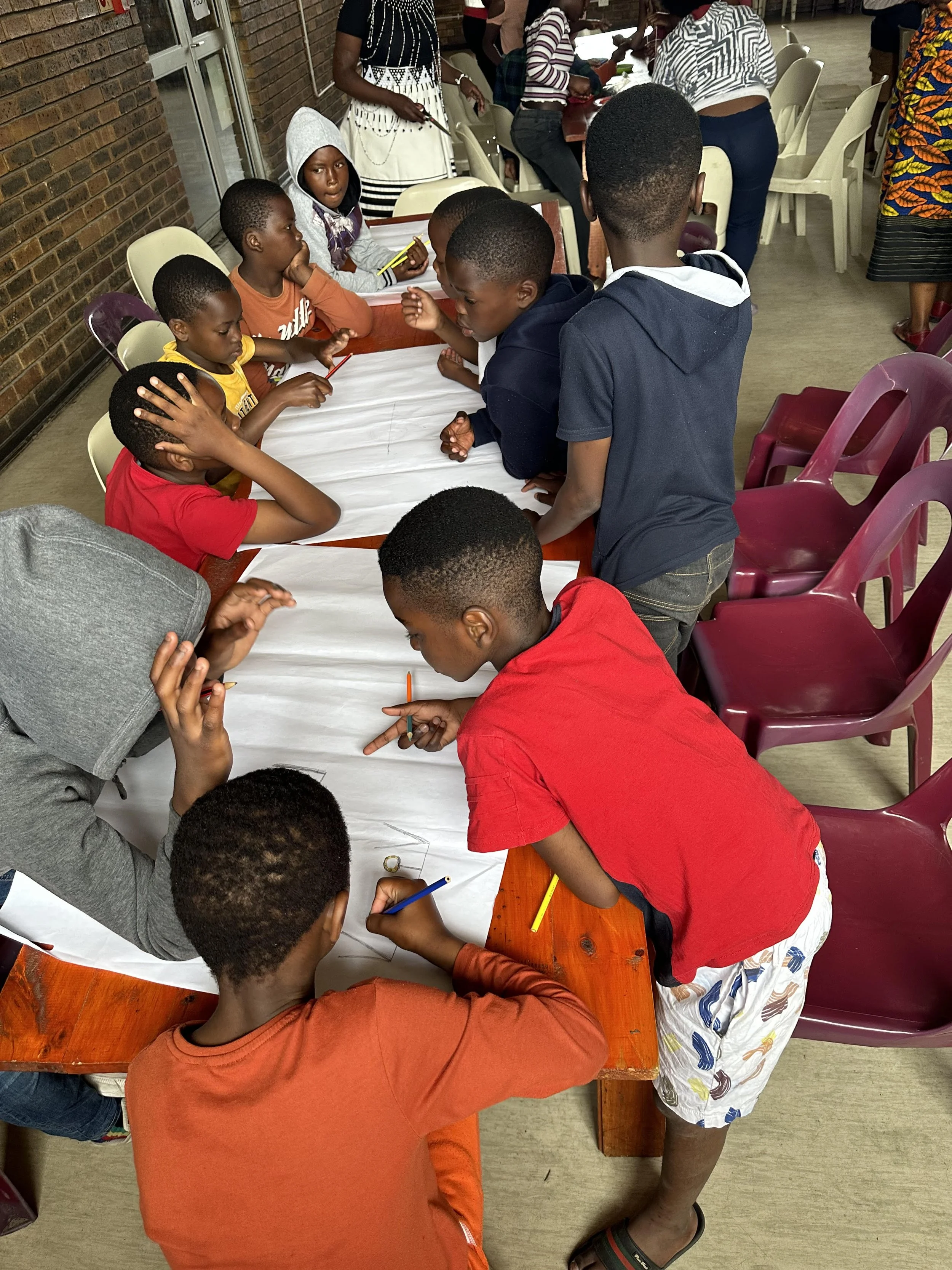 Boys at Table Drawing.jpg